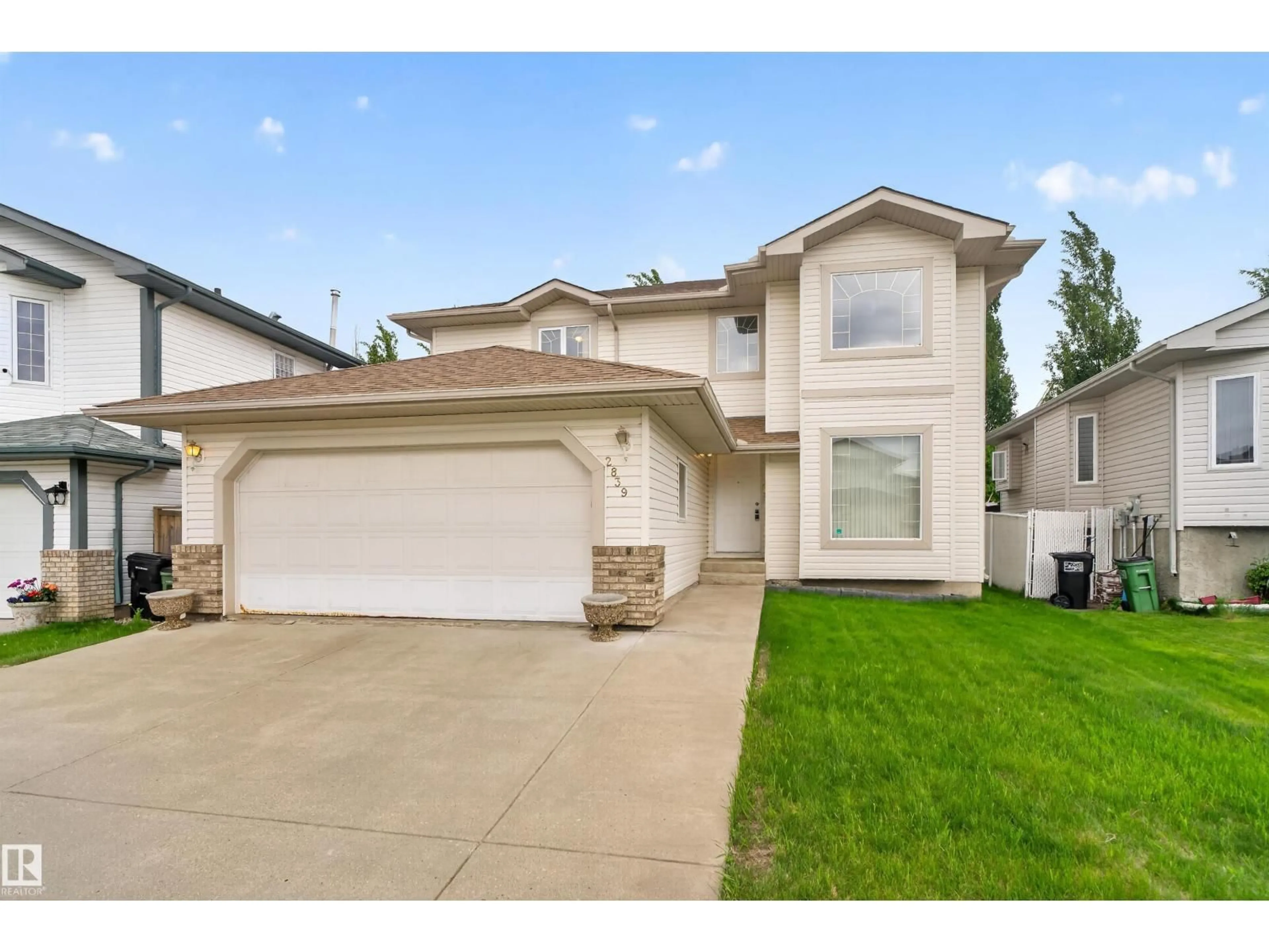 Home with vinyl exterior material, street for 2839 151A AV, Edmonton Alberta T5Y2T7