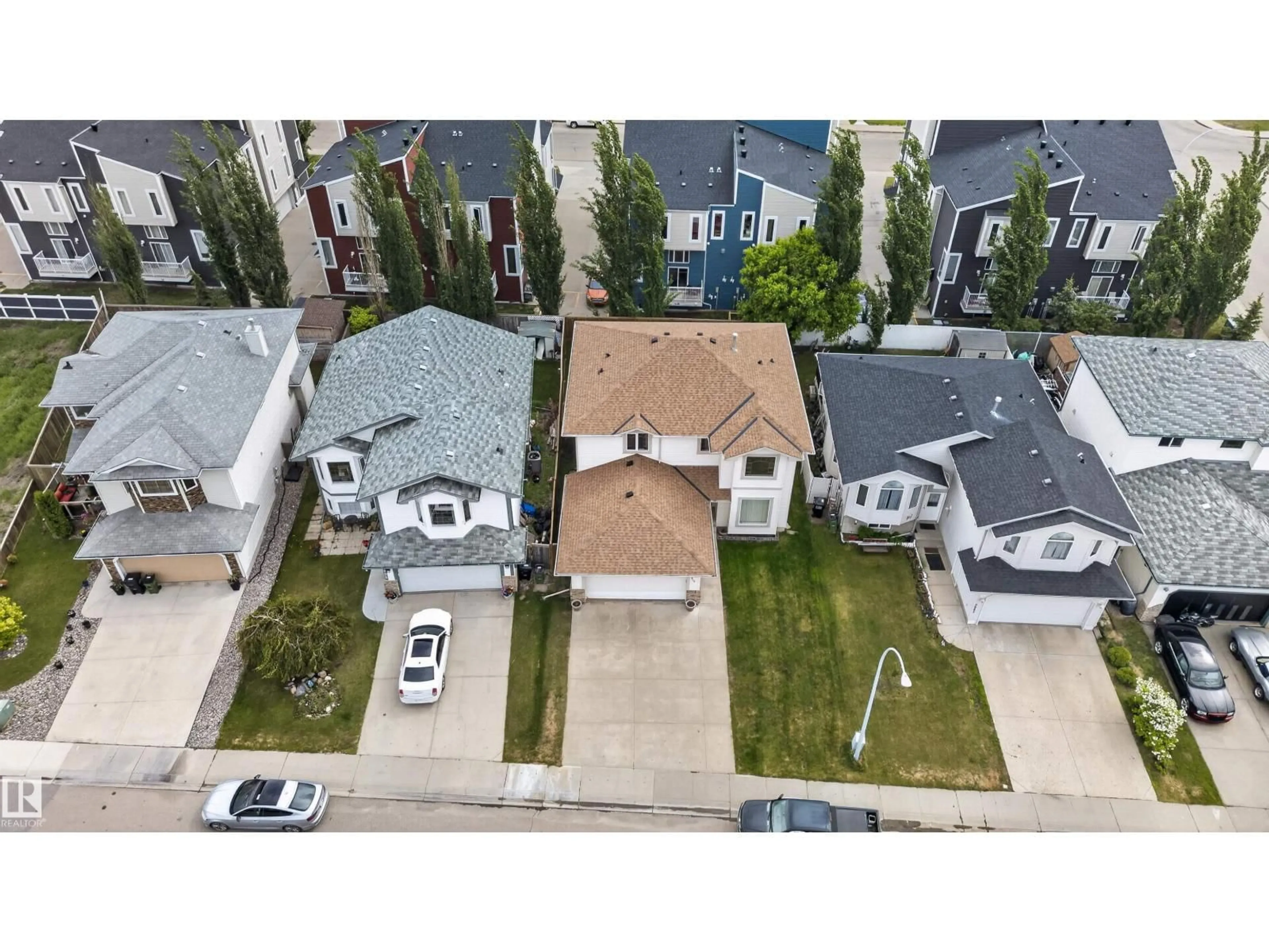 A pic from outside/outdoor area/front of a property/back of a property/a pic from drone, street for 2839 151A AV, Edmonton Alberta T5Y2T7