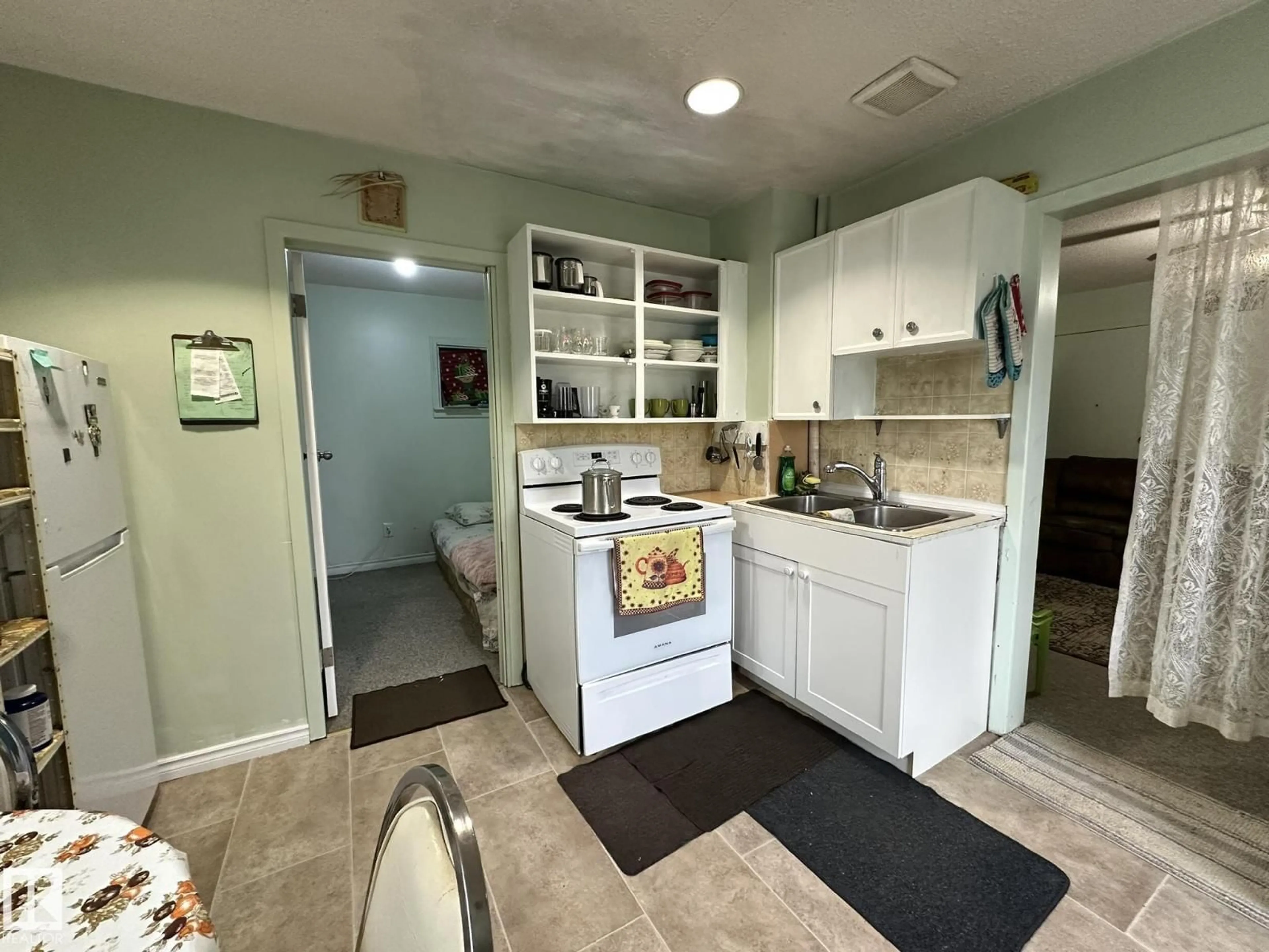 Standard kitchen, ceramic/tile floor for 4404 52 ST, Smoky Lake Town Alberta T0A3C0