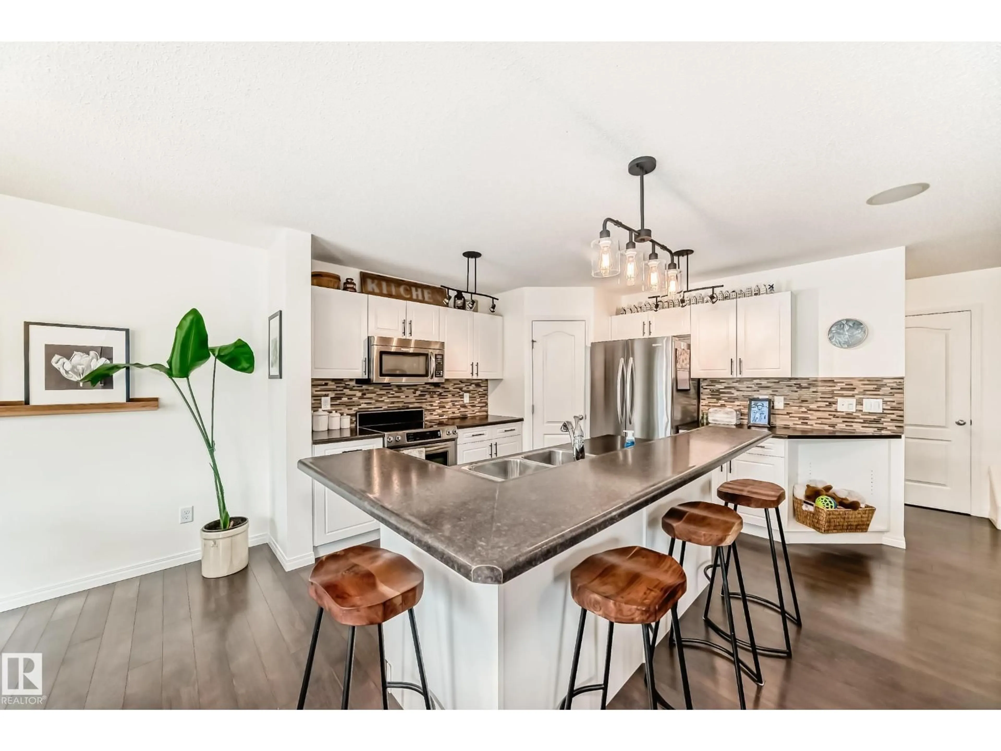 Open concept kitchen, ceramic/tile floor for SW - 732 172 ST, Edmonton Alberta T6W0M5