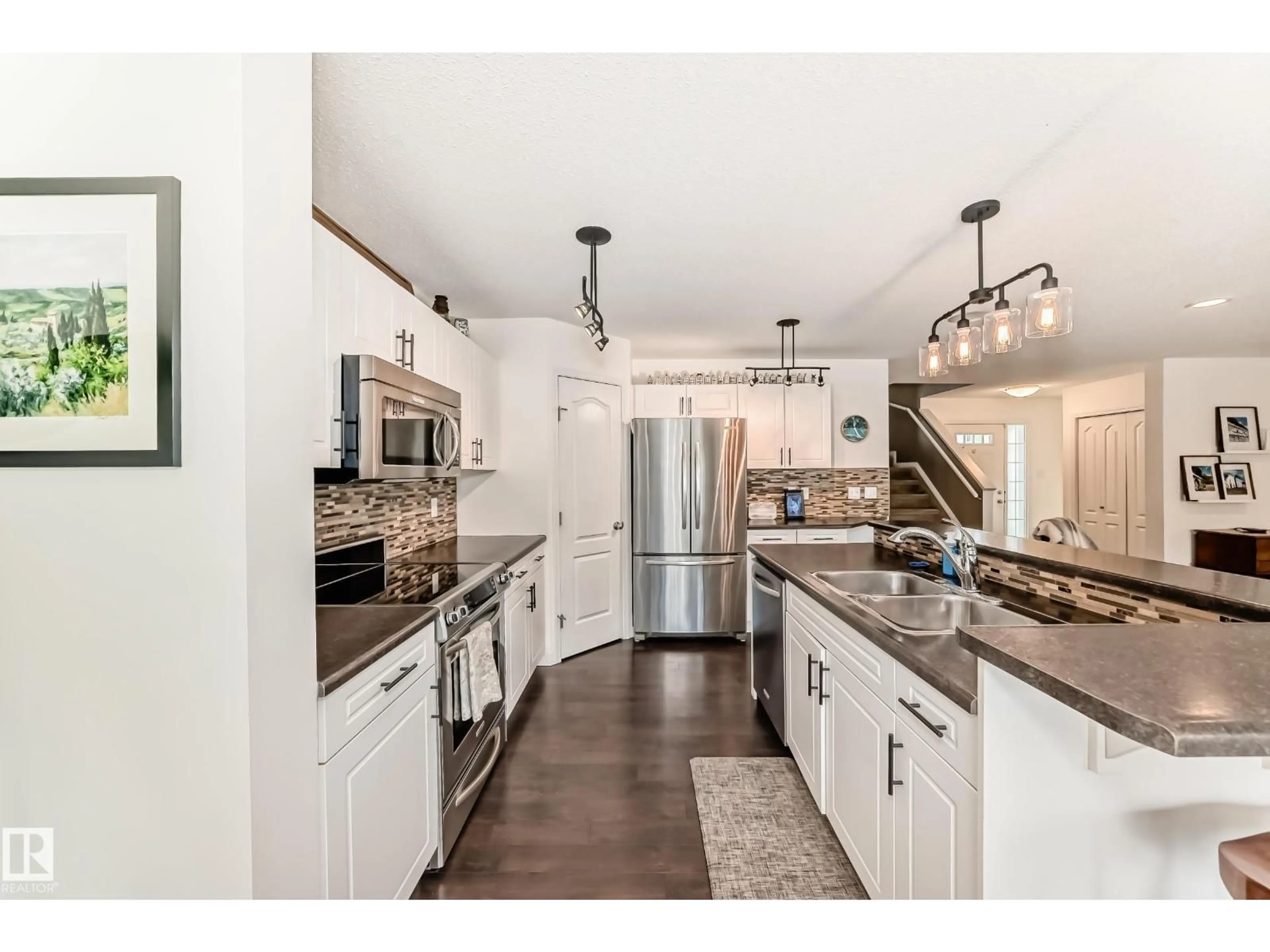 Open concept kitchen, ceramic/tile floor for SW - 732 172 ST, Edmonton Alberta T6W0M5