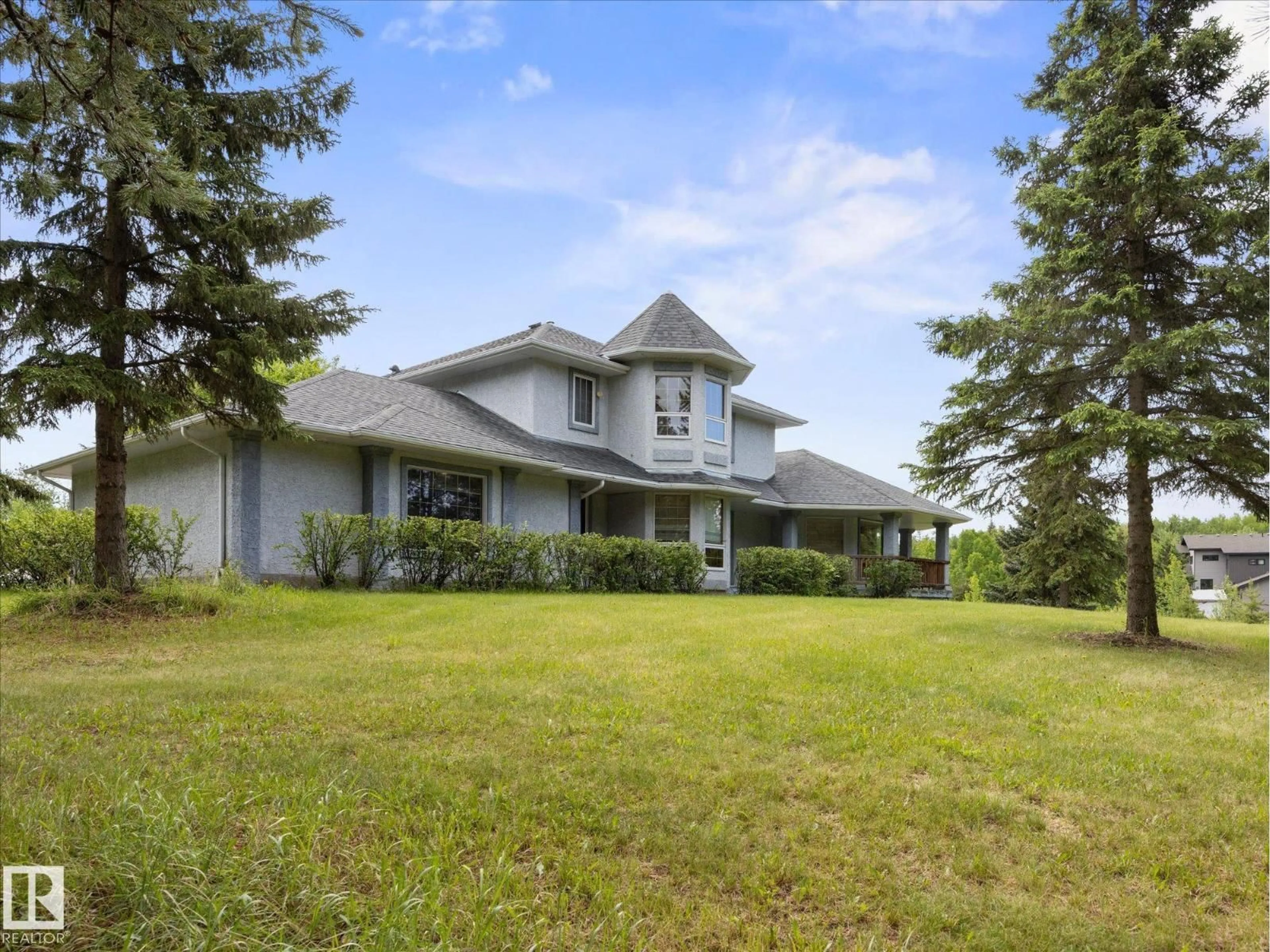A pic from outside/outdoor area/front of a property/back of a property/a pic from drone, unknown for 53211 RR 13, Rural Parkland County Alberta T7Y0C1
