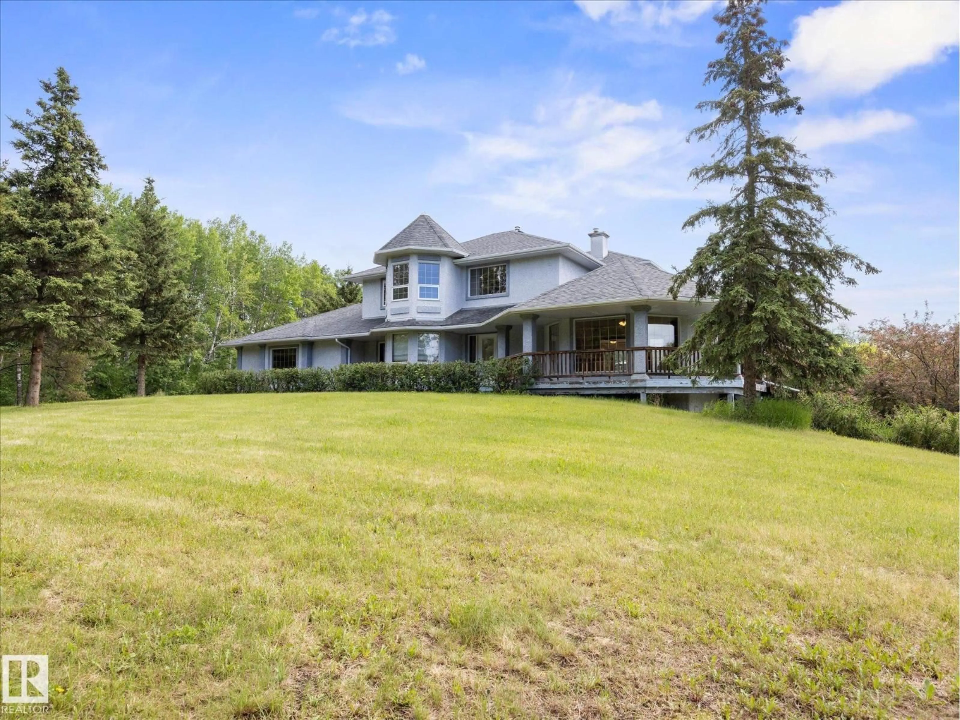 A pic from outside/outdoor area/front of a property/back of a property/a pic from drone, mountain view for 53211 RR 13, Rural Parkland County Alberta T7Y0C1
