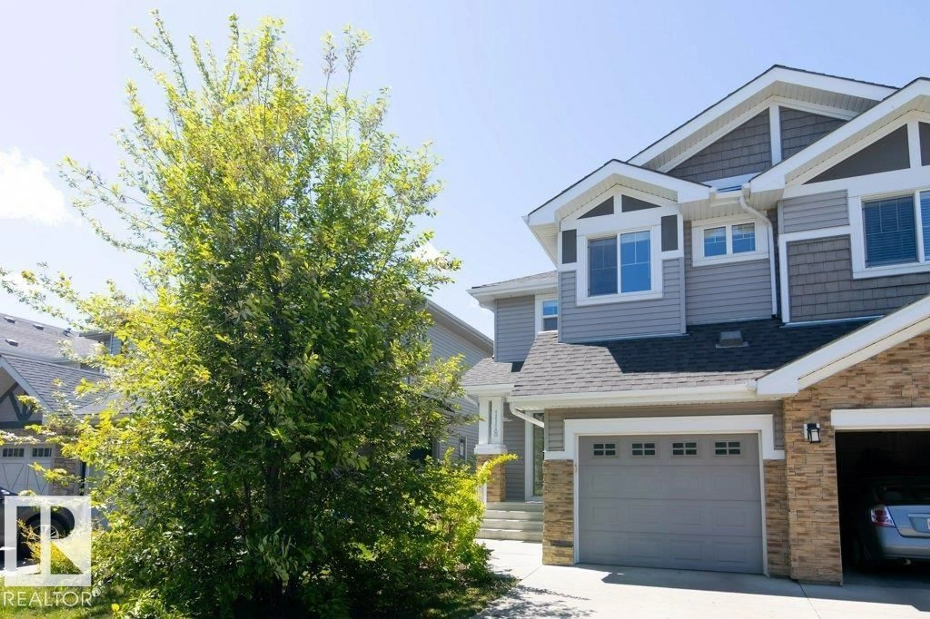 Home with vinyl exterior material, street for SW - 1118 162 ST, Edmonton Alberta T6W2L1