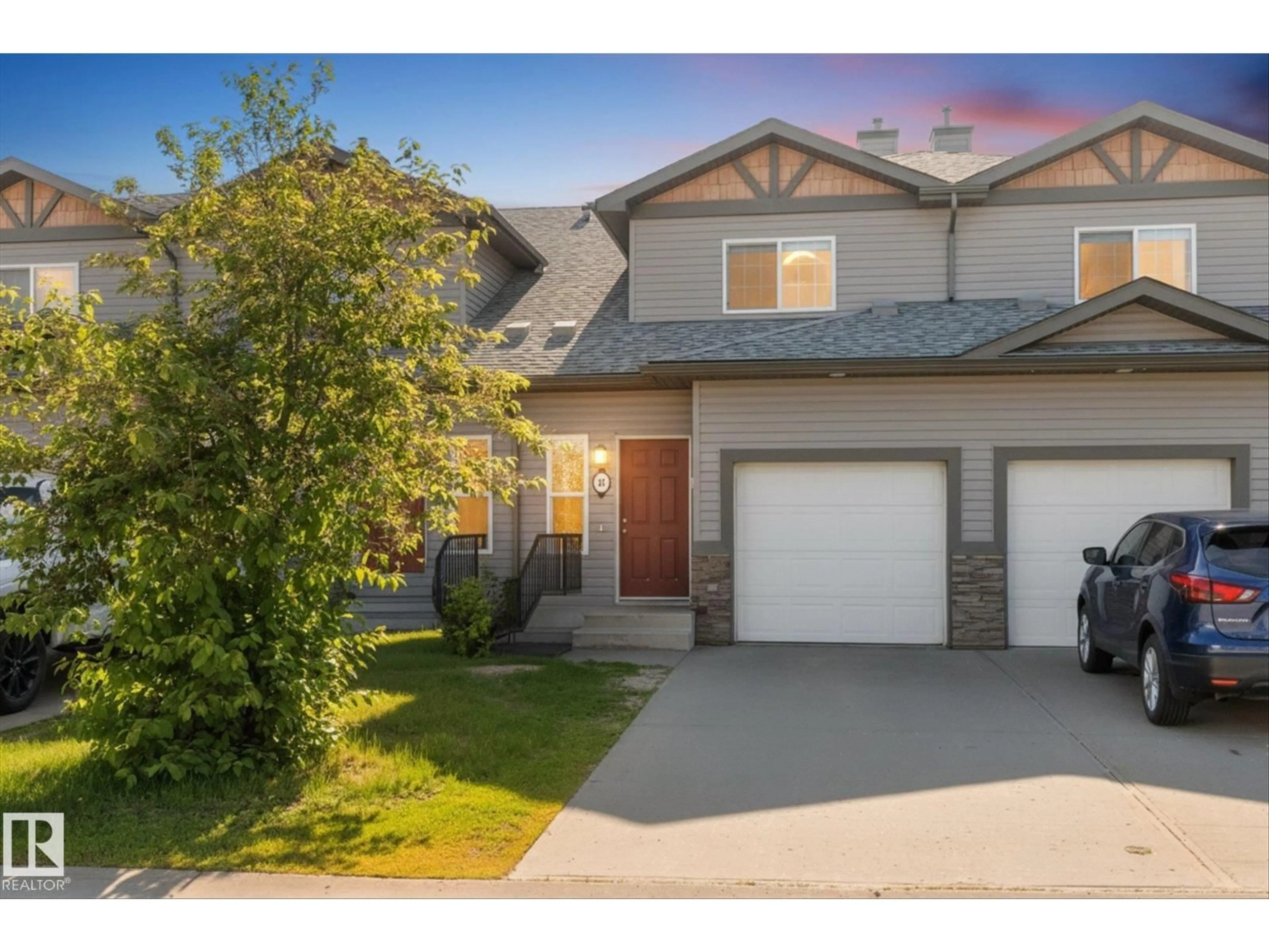 Home with vinyl exterior material, street for 15 - 67 WOODSMERE, Fort Saskatchewan Alberta T8L4S2