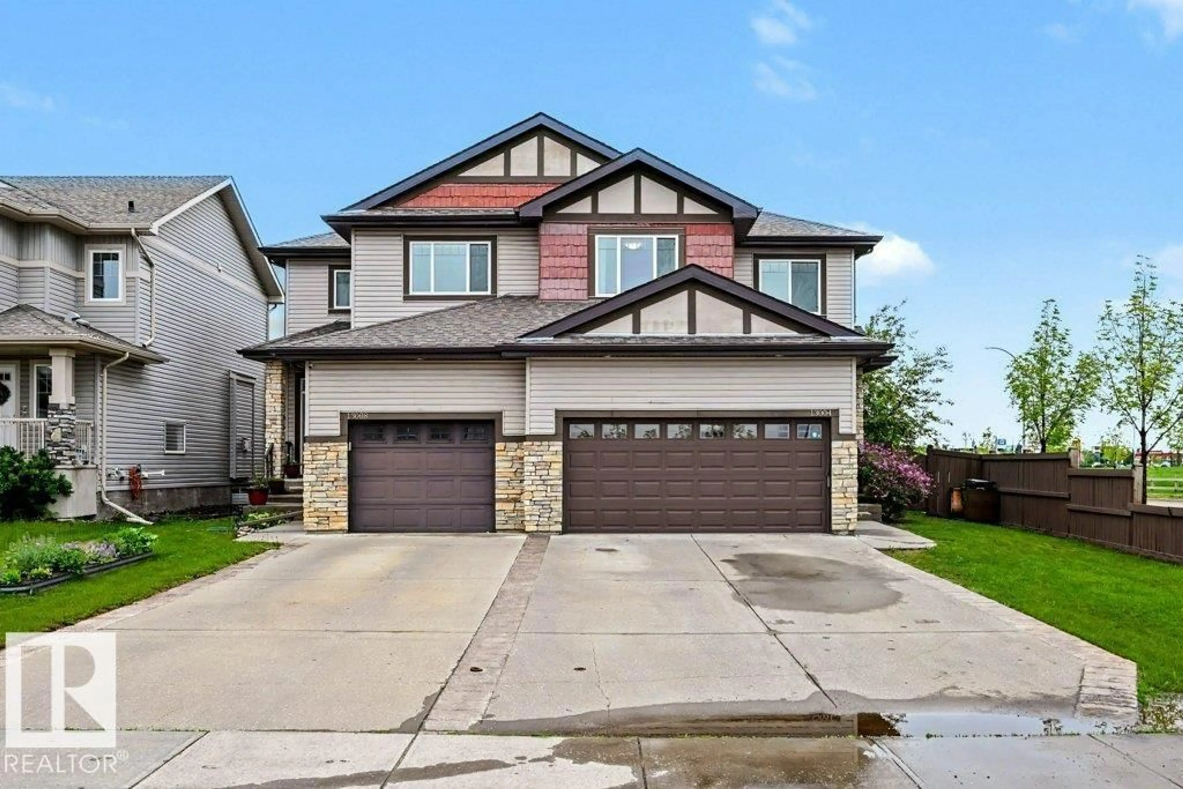 Home with vinyl exterior material, street for 13004 164 AV, Edmonton Alberta T6V0E7