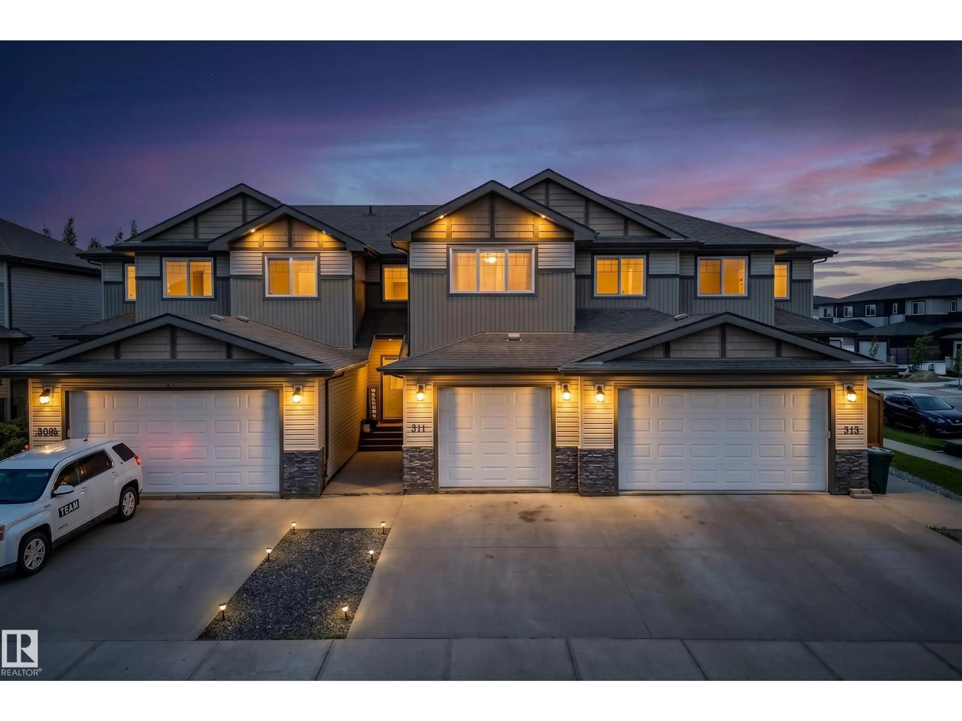 A pic from outside/outdoor area/front of a property/back of a property/a pic from drone, street for 311 GENESIS VI, Stony Plain Alberta T7Z0J6