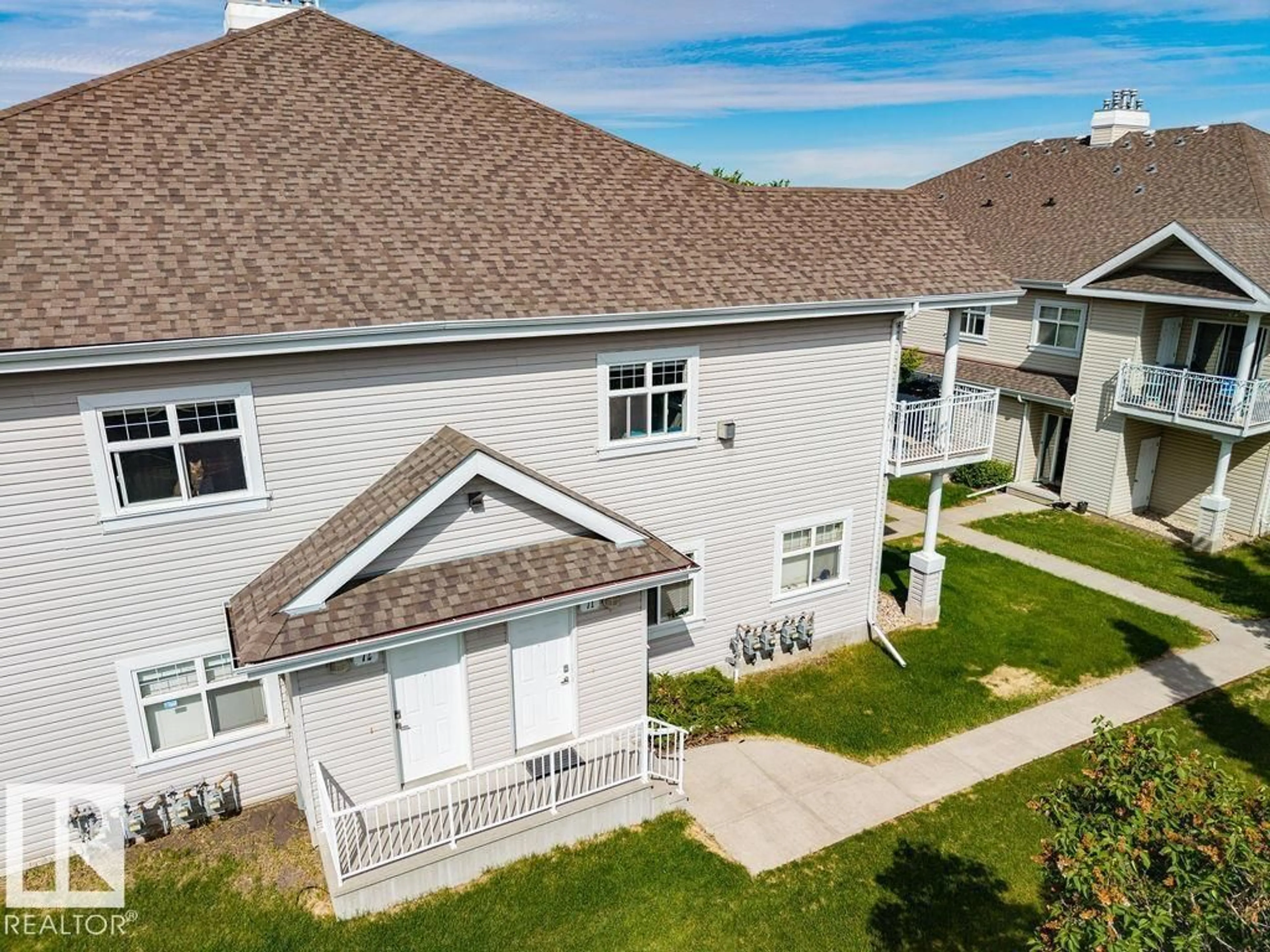 A pic from outside/outdoor area/front of a property/back of a property/a pic from drone, unknown for #71 - 3040 SPENCE WD, Edmonton Alberta T6X1N7