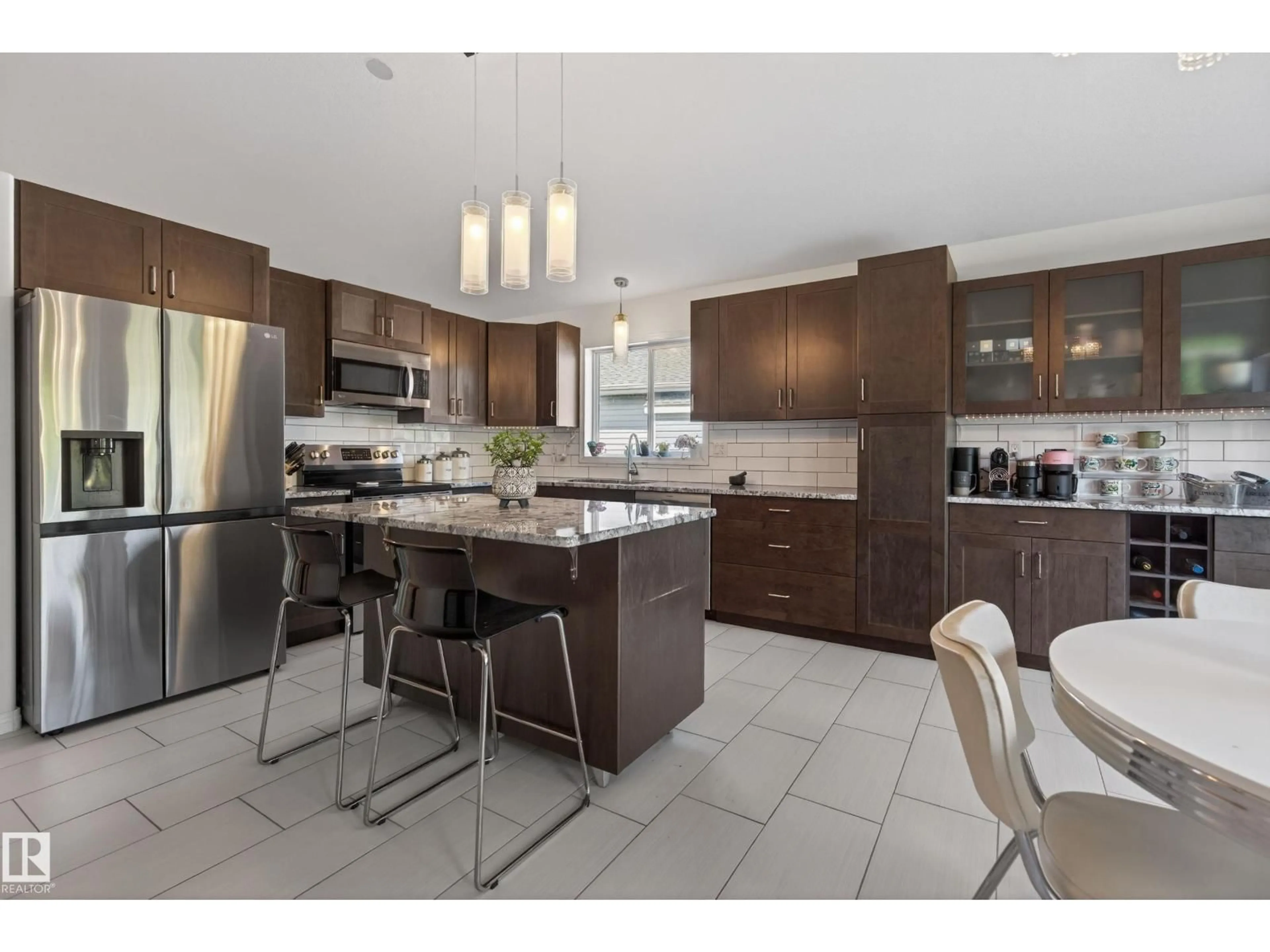 Open concept kitchen, ceramic/tile floor for 5139 SPORTSVIEW DR, New Sarepta Alberta T0B3M0