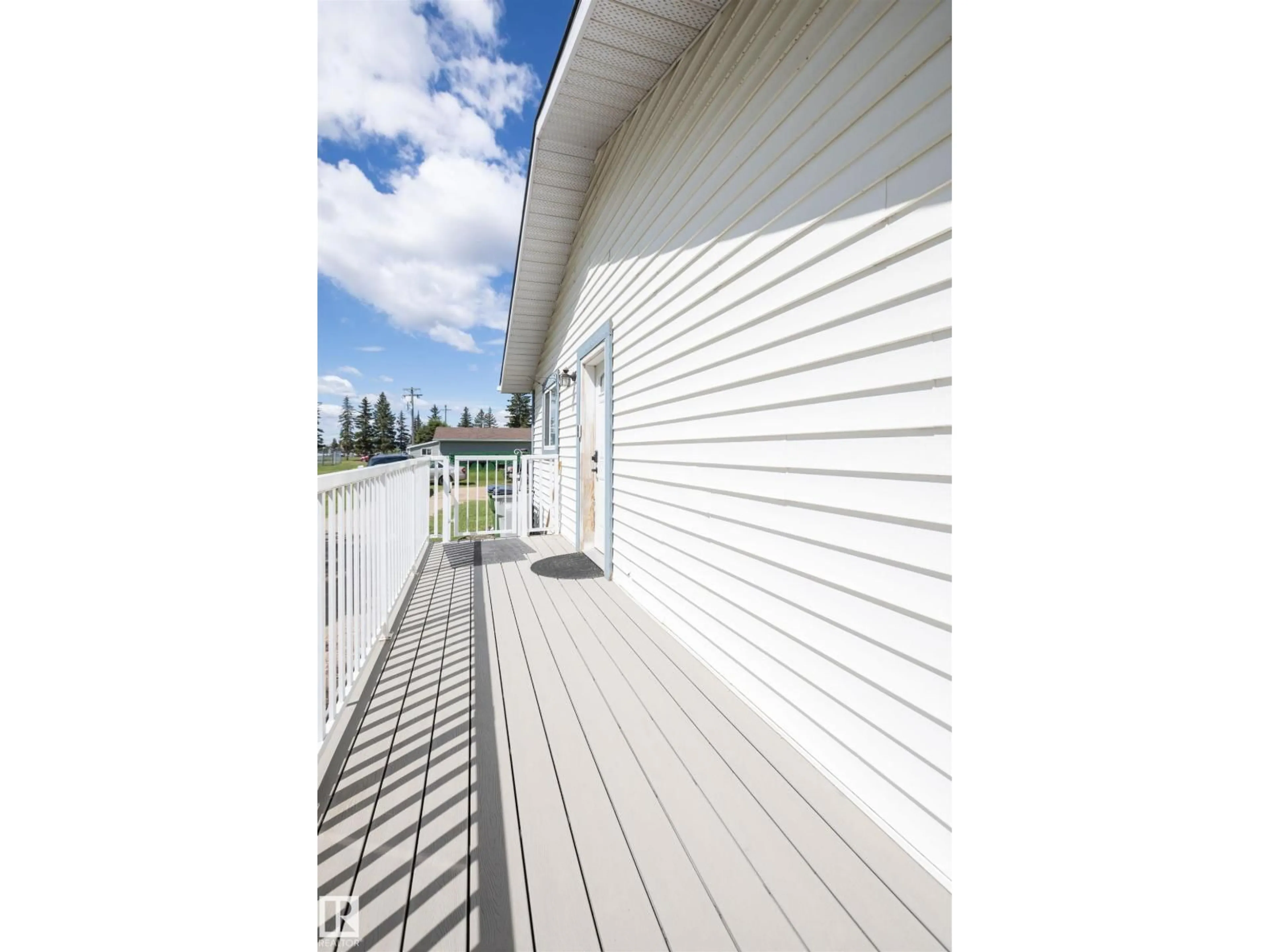 Home with vinyl exterior material, water/lake/river/ocean view for 10232 101 ST, Westlock Alberta T7P1X9