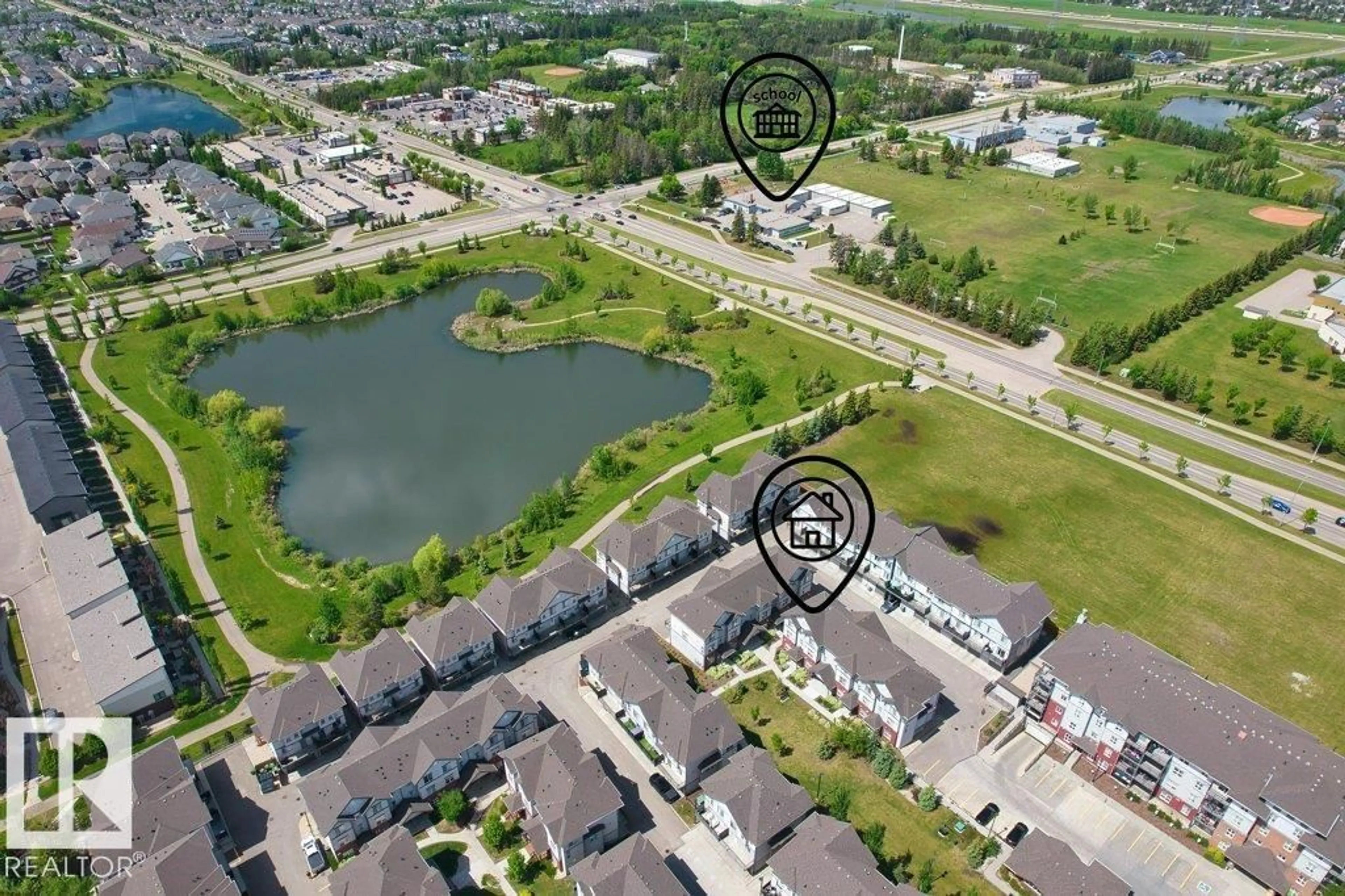 A pic from outside/outdoor area/front of a property/back of a property/a pic from drone, water/lake/river/ocean view for 655 - 125 WATT BV, Edmonton Alberta T6X0T2