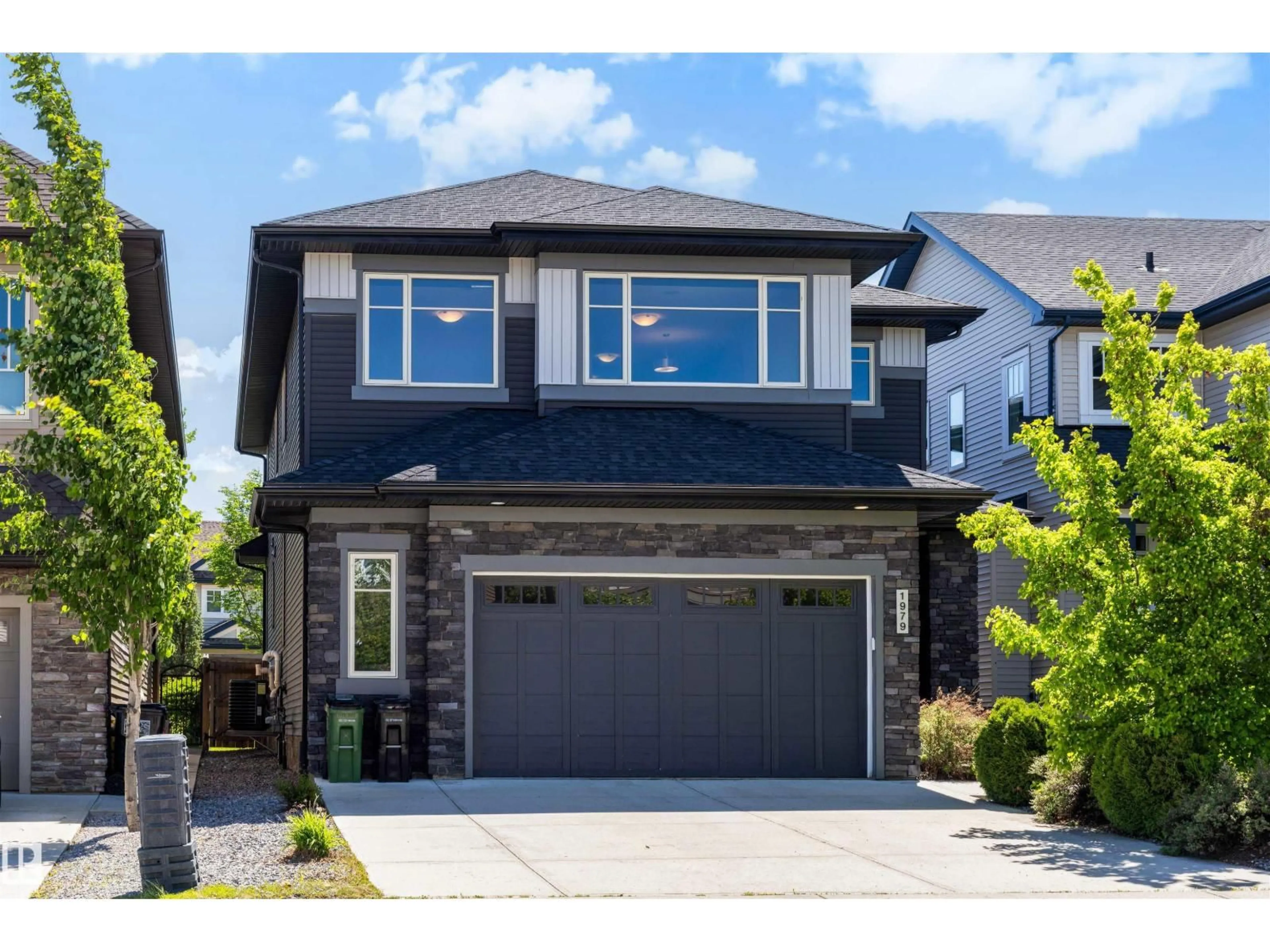 Home with vinyl exterior material, street for SW - 1979 AINSLIE LI, Edmonton Alberta T6W2M1