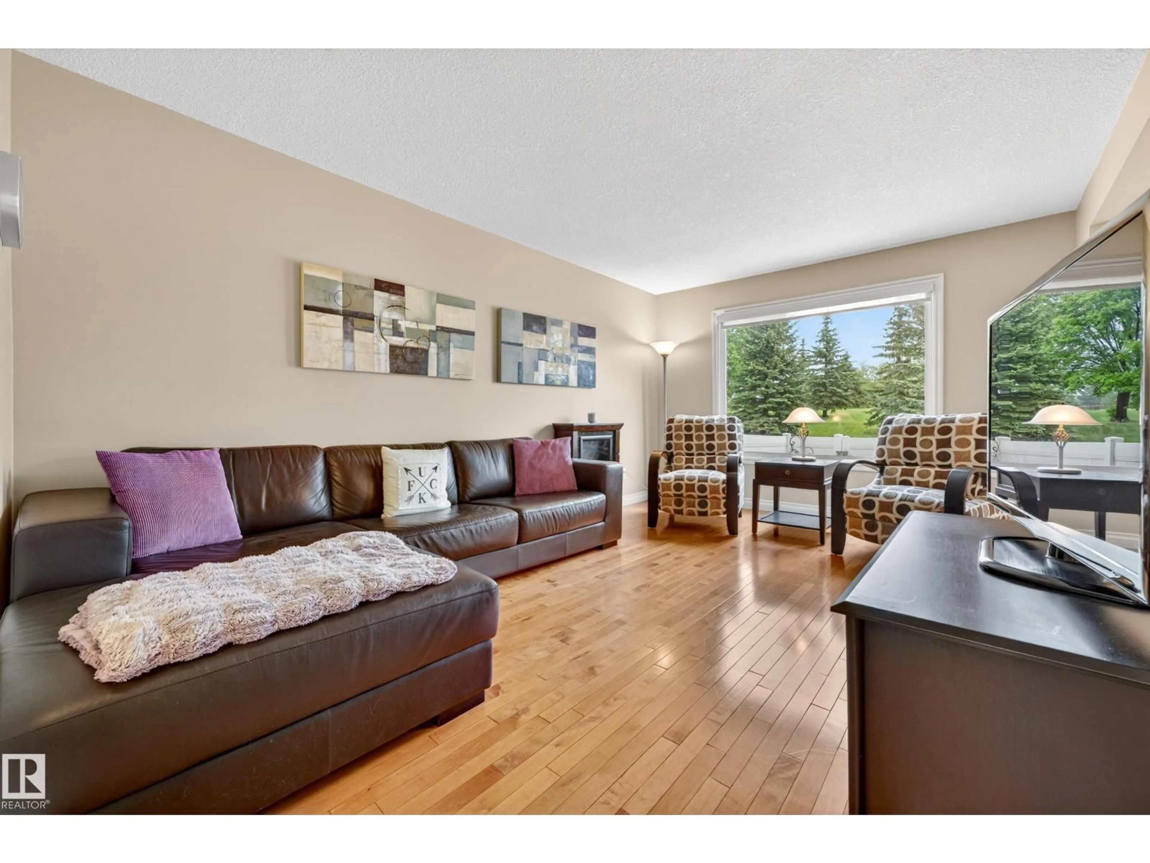 Living room with furniture, wood/laminate floor for 6 GREAT OAKS, Sherwood Park Alberta T8A0V8