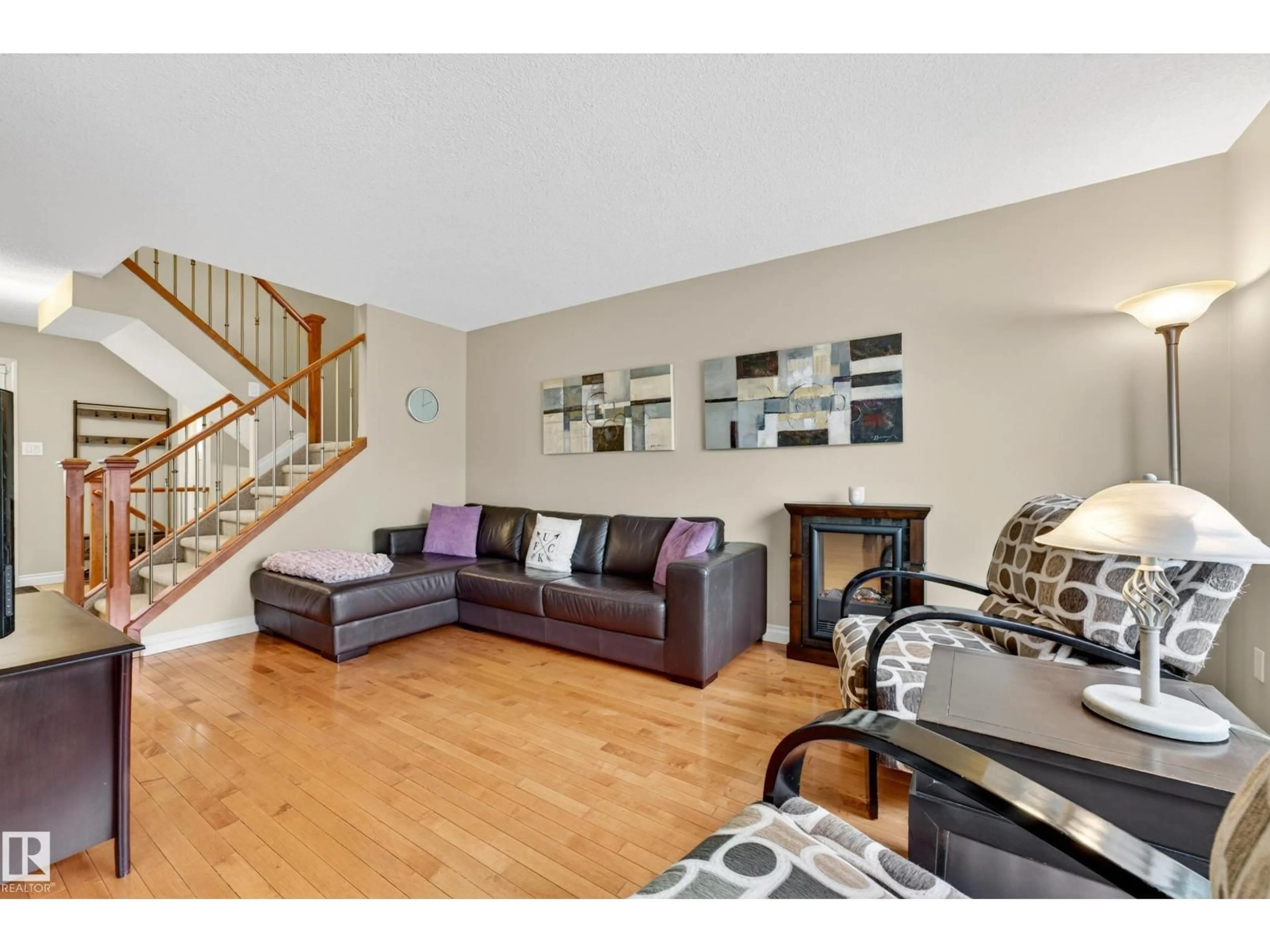 Living room with furniture, wood/laminate floor for 6 GREAT OAKS, Sherwood Park Alberta T8A0V8