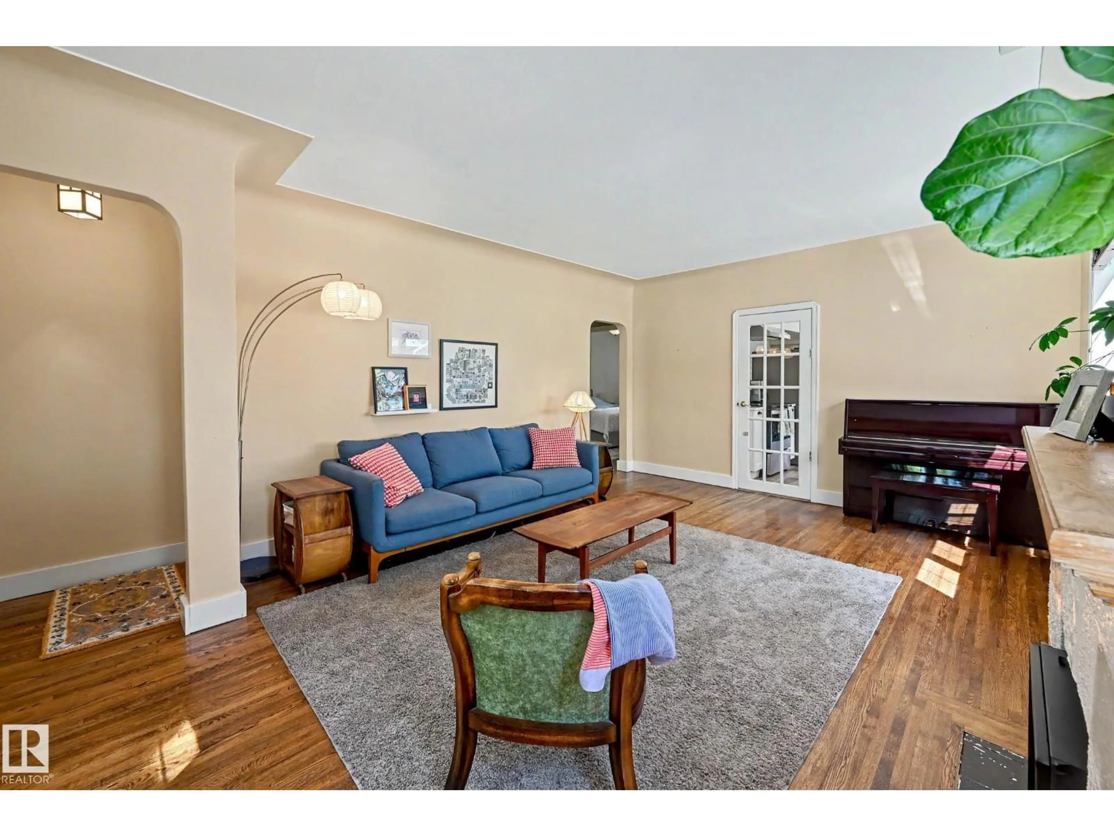 Living room with furniture, wood/laminate floor for 11603 71 ST, Edmonton Alberta T5B1W3