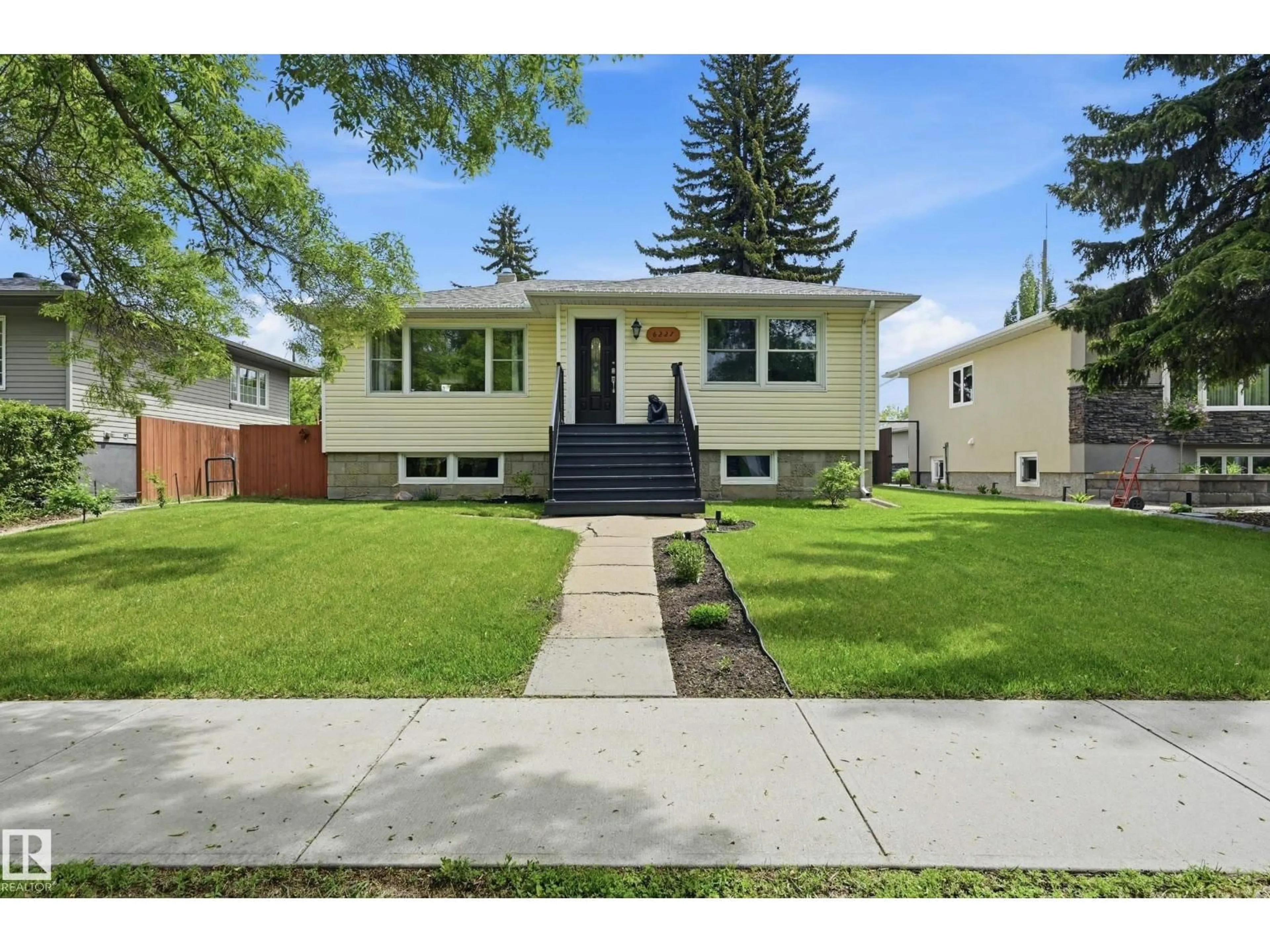 Home with vinyl exterior material, street for NW - 6227 109A ST, Edmonton Alberta T6H3C6