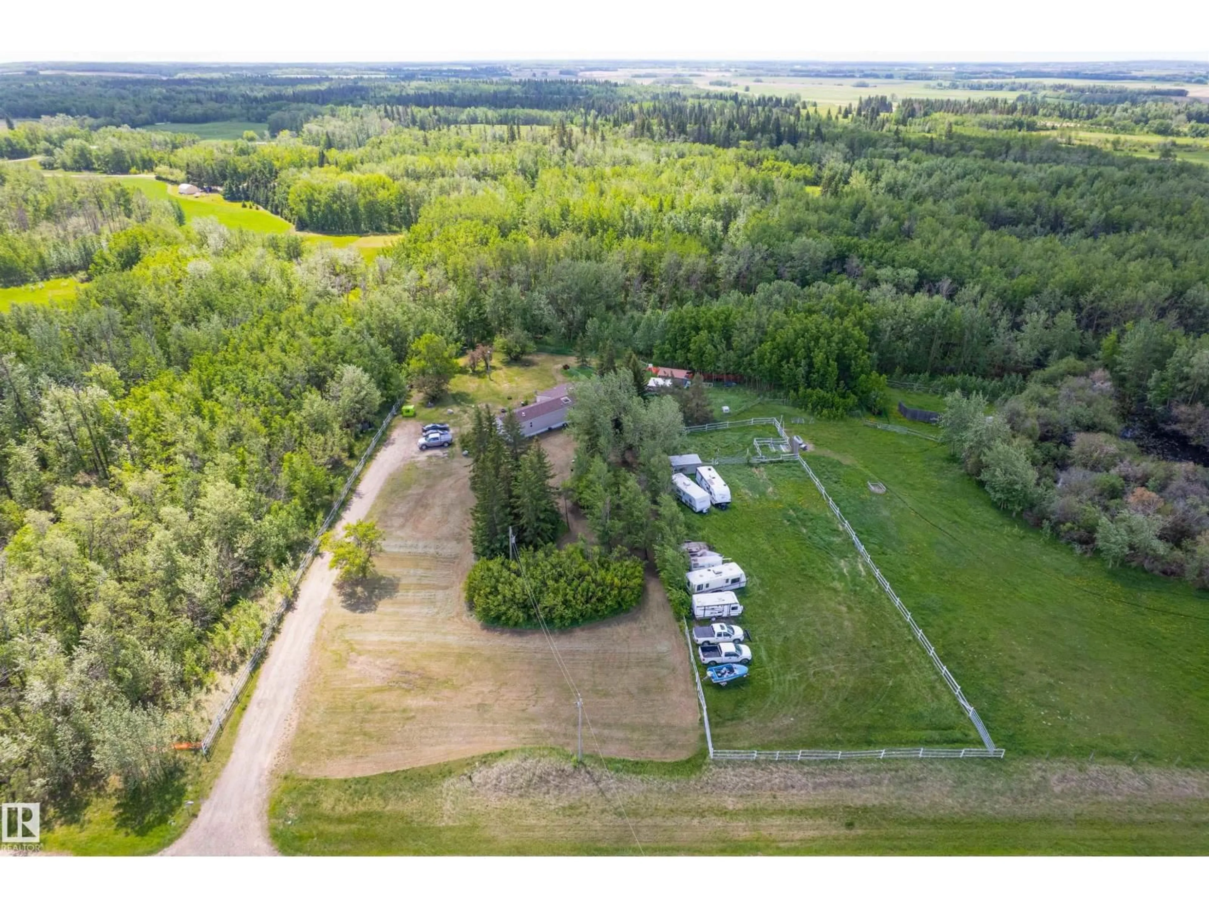 A pic from outside/outdoor area/front of a property/back of a property/a pic from drone, forest/trees view for 20519 TWP ROAD 550, Rural Strathcona County Alberta T8L4B6