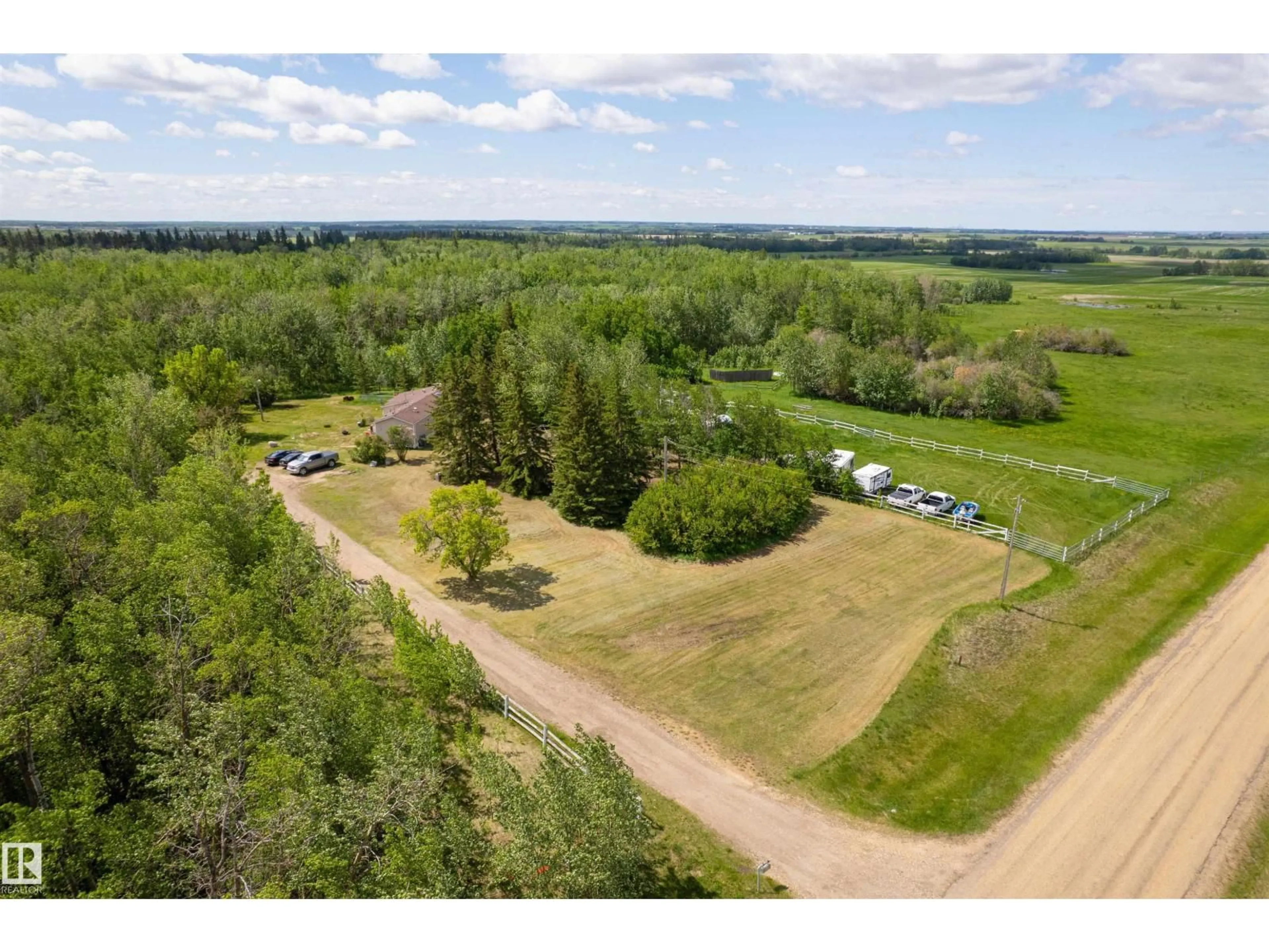 A pic from outside/outdoor area/front of a property/back of a property/a pic from drone, forest/trees view for 20519 TWP ROAD 550, Rural Strathcona County Alberta T8L4B6