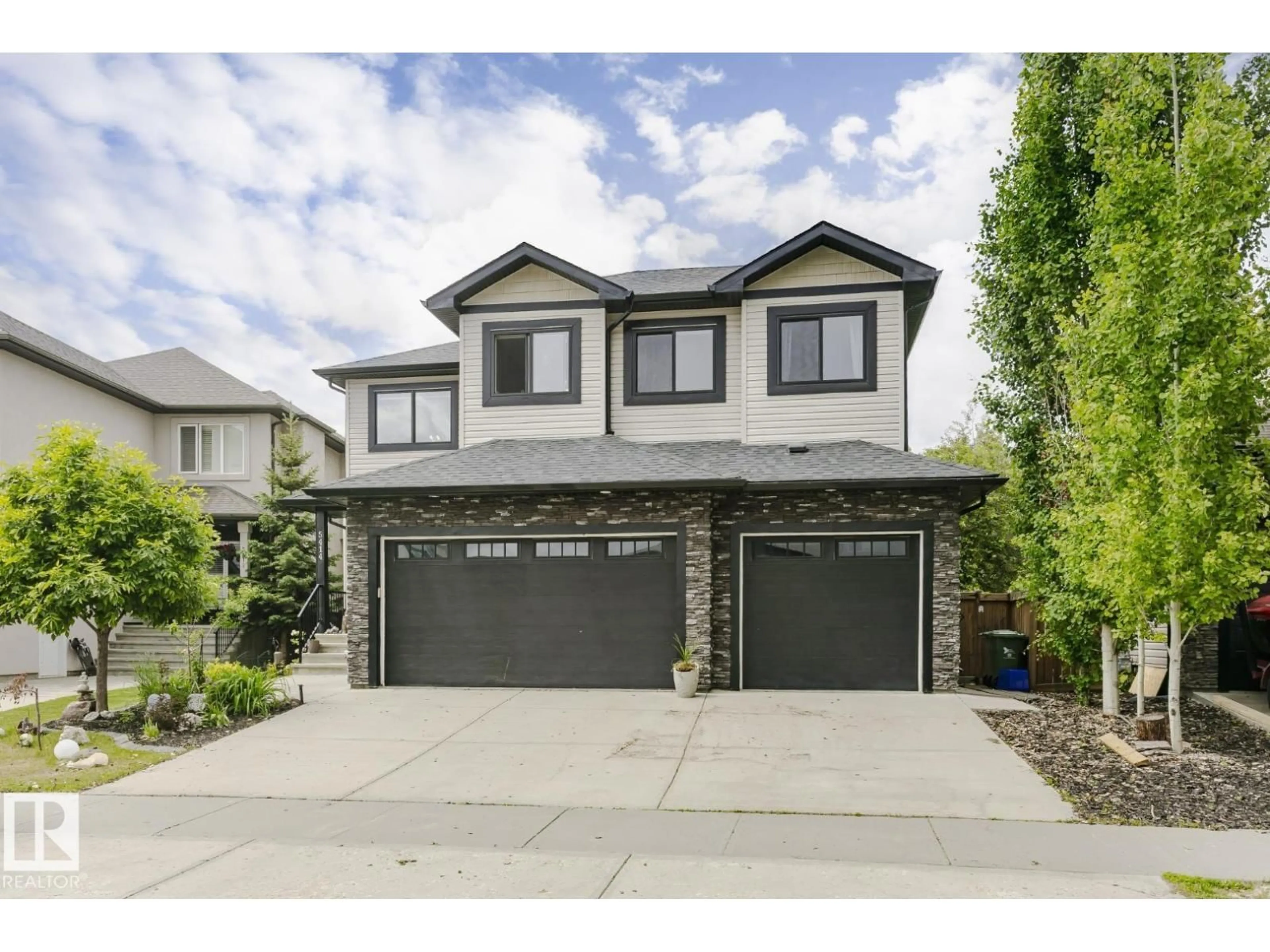 Home with vinyl exterior material, street for 5414 64 ST, Beaumont Alberta T4X0H2