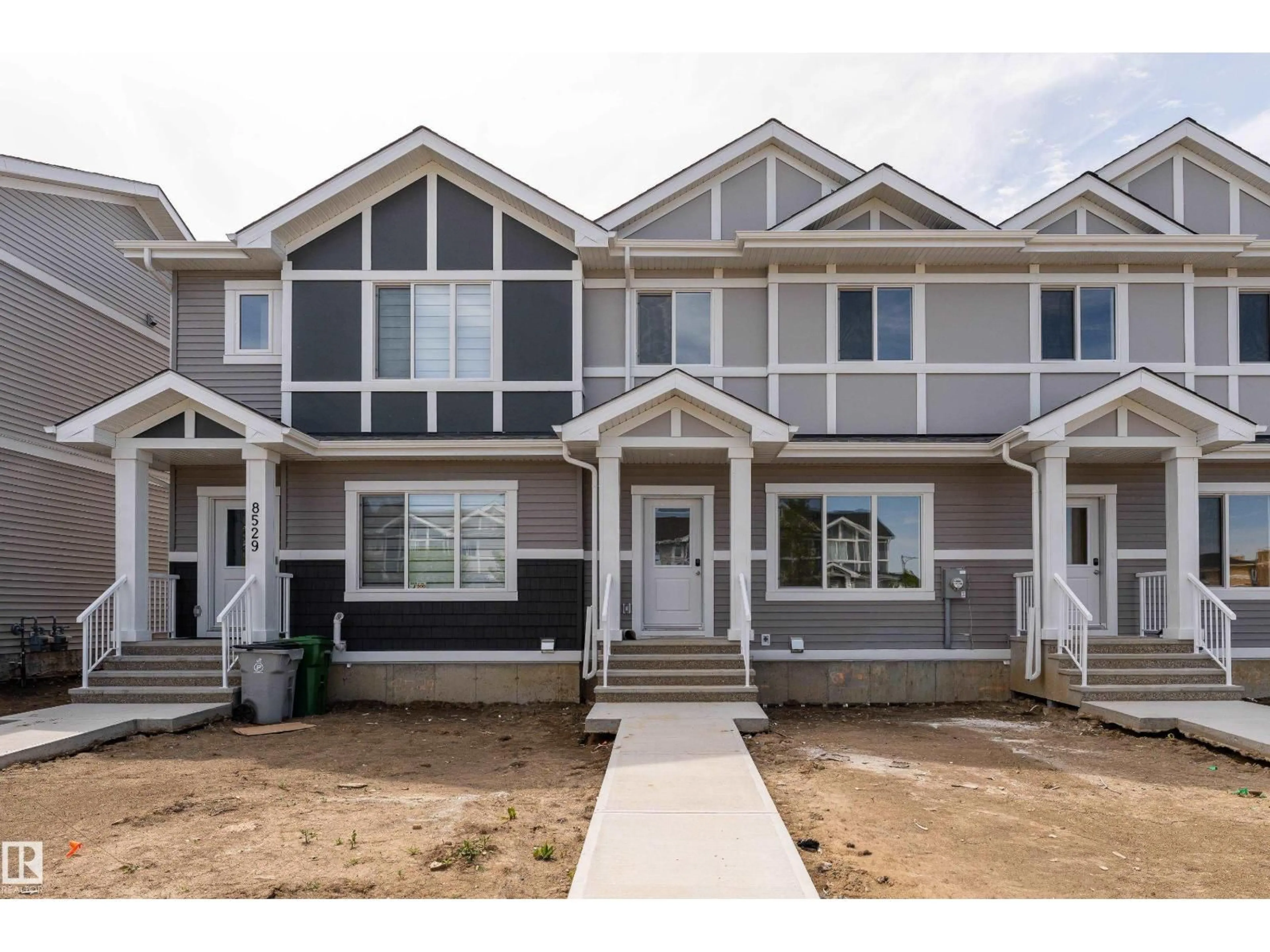 Home with vinyl exterior material, street for 8531 96 AV, Morinville Alberta T8R2R5