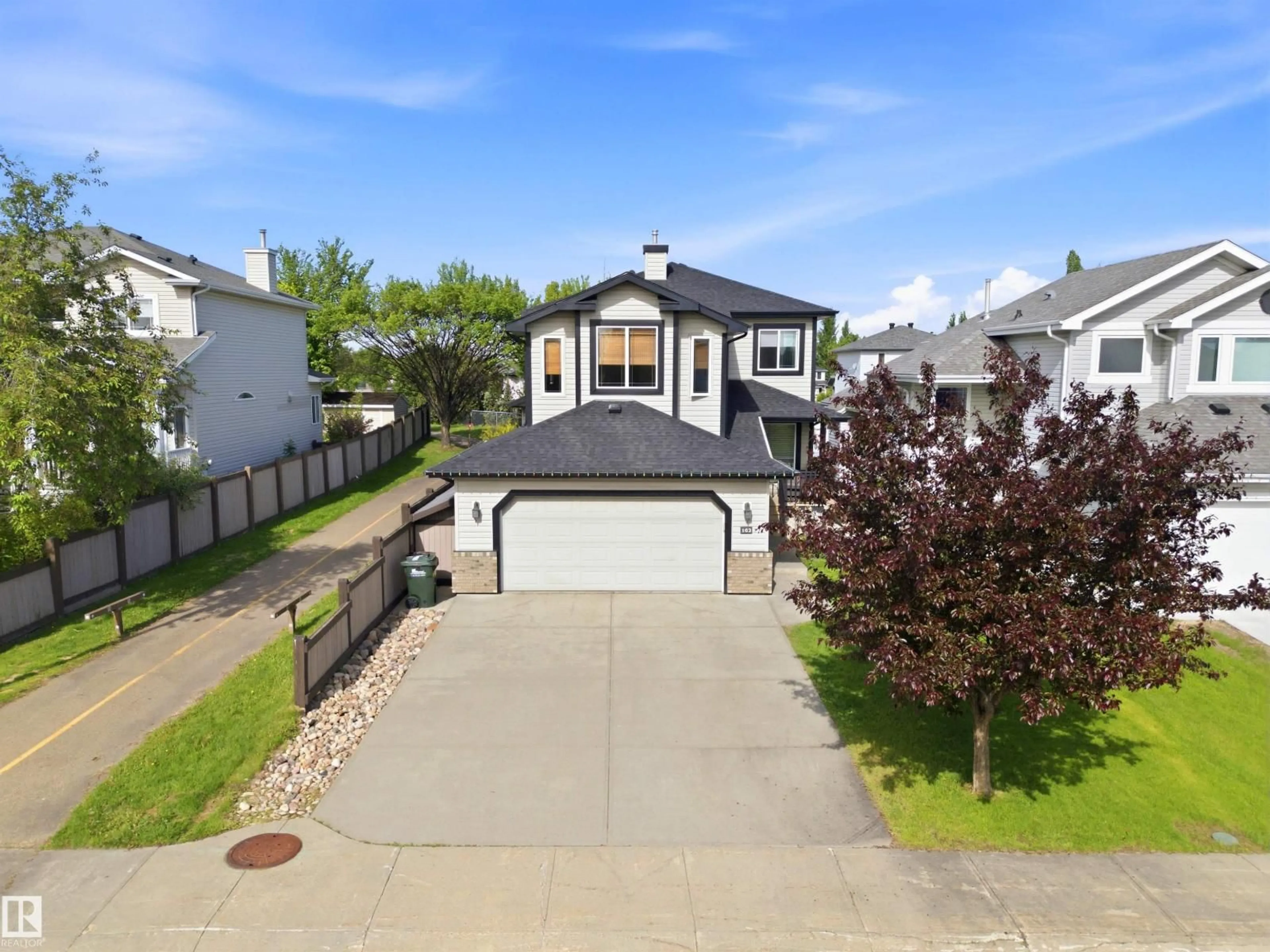 A pic from outside/outdoor area/front of a property/back of a property/a pic from drone, street for 162 SUNFLOWER CR, Sherwood Park Alberta T8H2N2