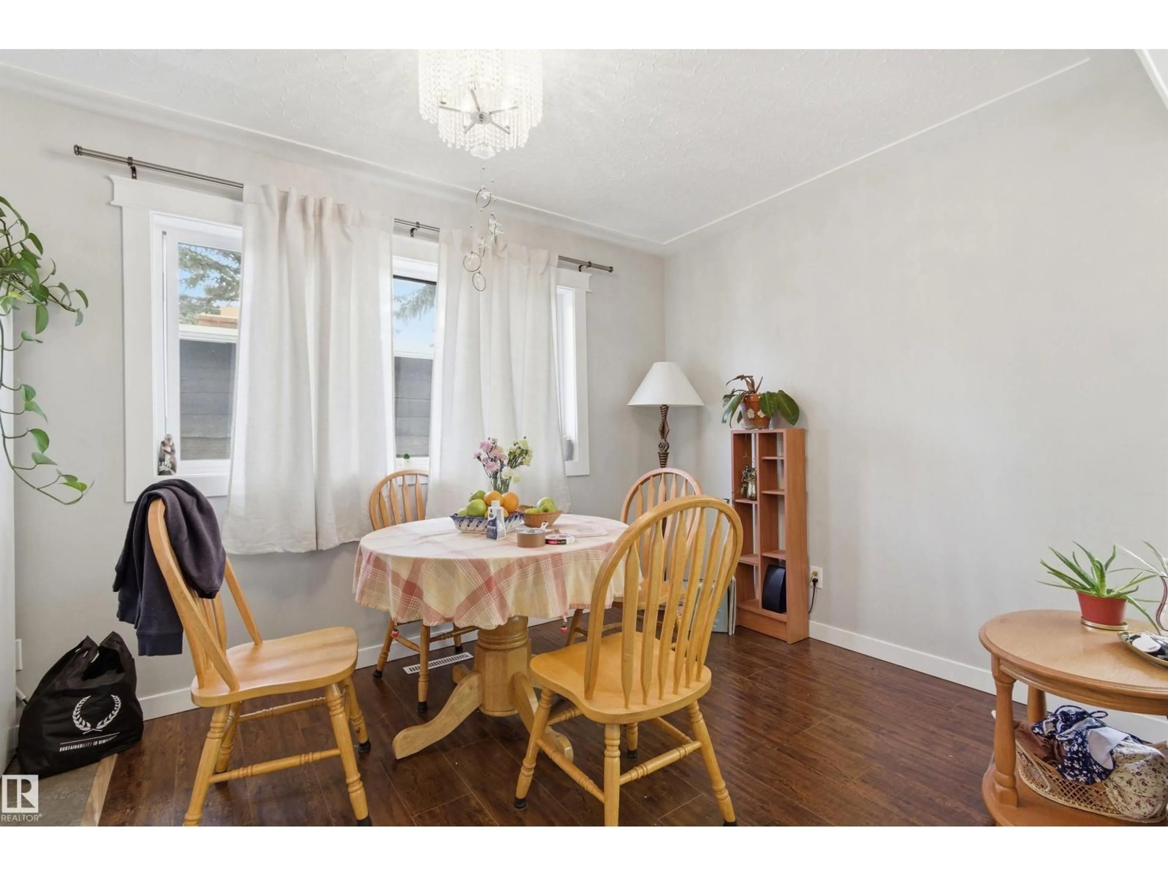 Dining room, wood/laminate floor for 7412/7414 83 AV, Edmonton Alberta T6B0G6