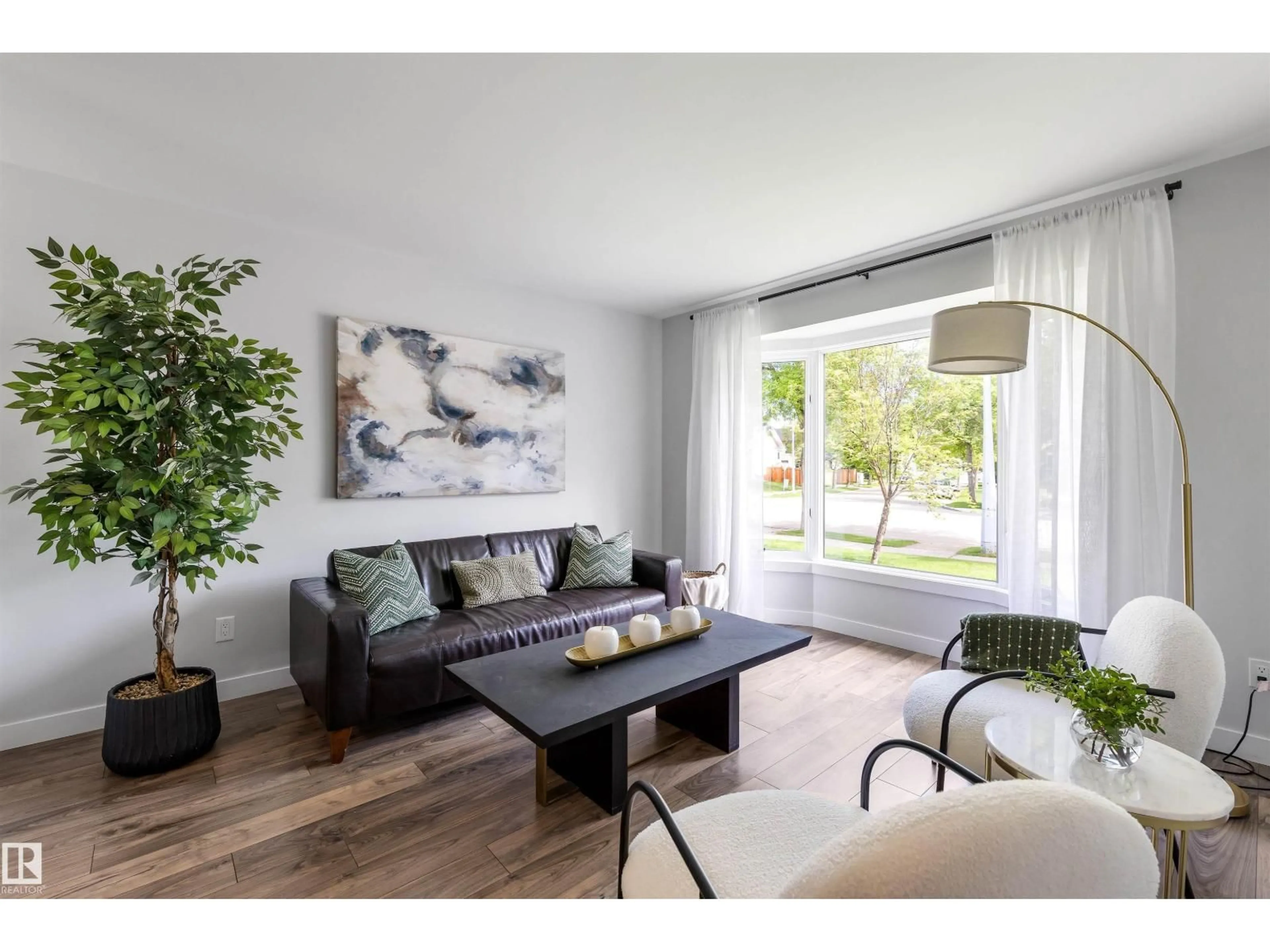 Living room with furniture, wood/laminate floor for 98 LANGHOLM DR, St. Albert Alberta T8N4N6
