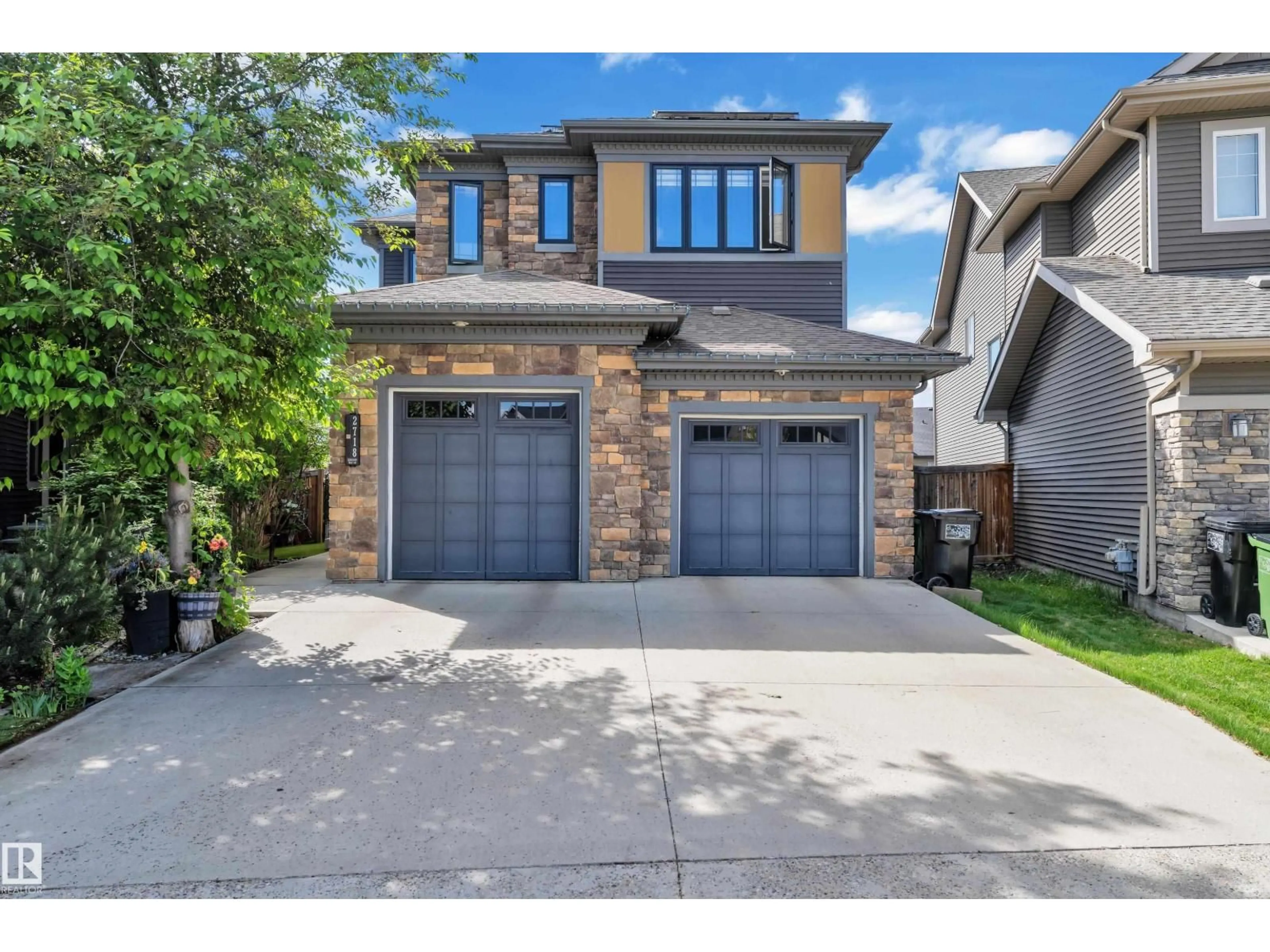 Home with brick exterior material, street for 2718 KIRKLAND WY, Edmonton Alberta T6W2R4