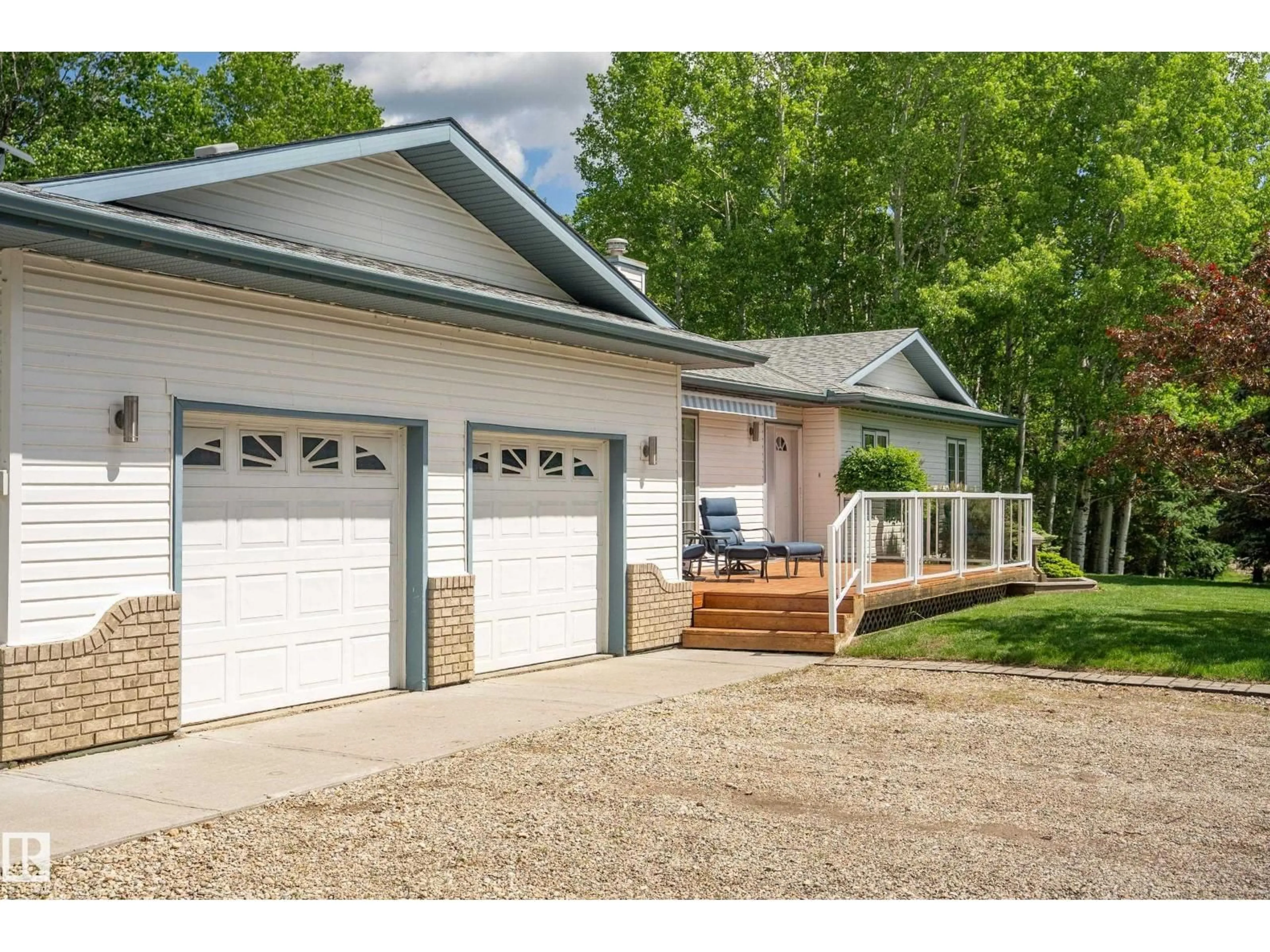 Home with vinyl exterior material, street for 100 53315 RGE RD 20, Rural Parkland County Alberta T7Z1X2