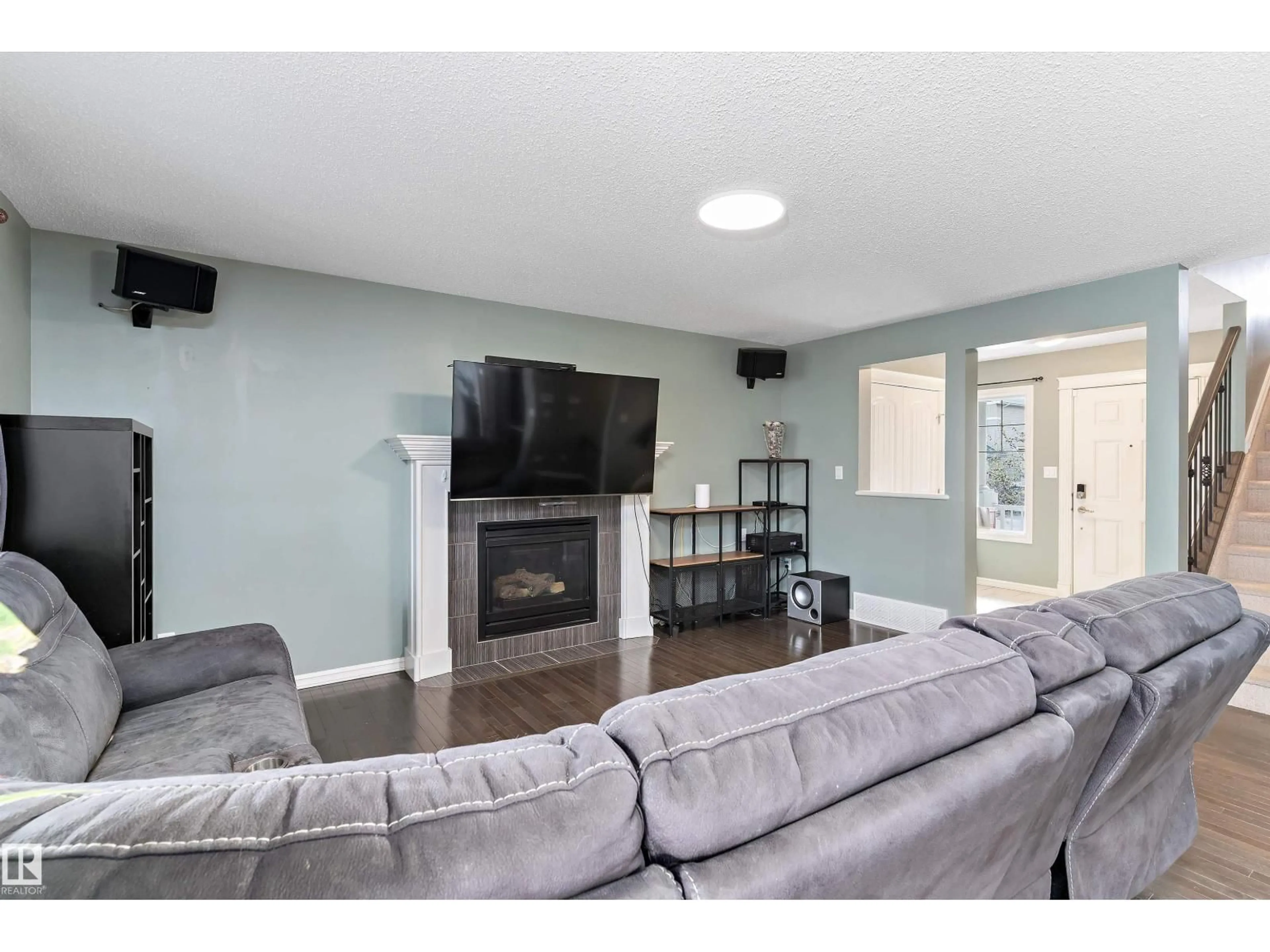 Living room with furniture, unknown for 1332 72 ST, Edmonton Alberta T6X0H2