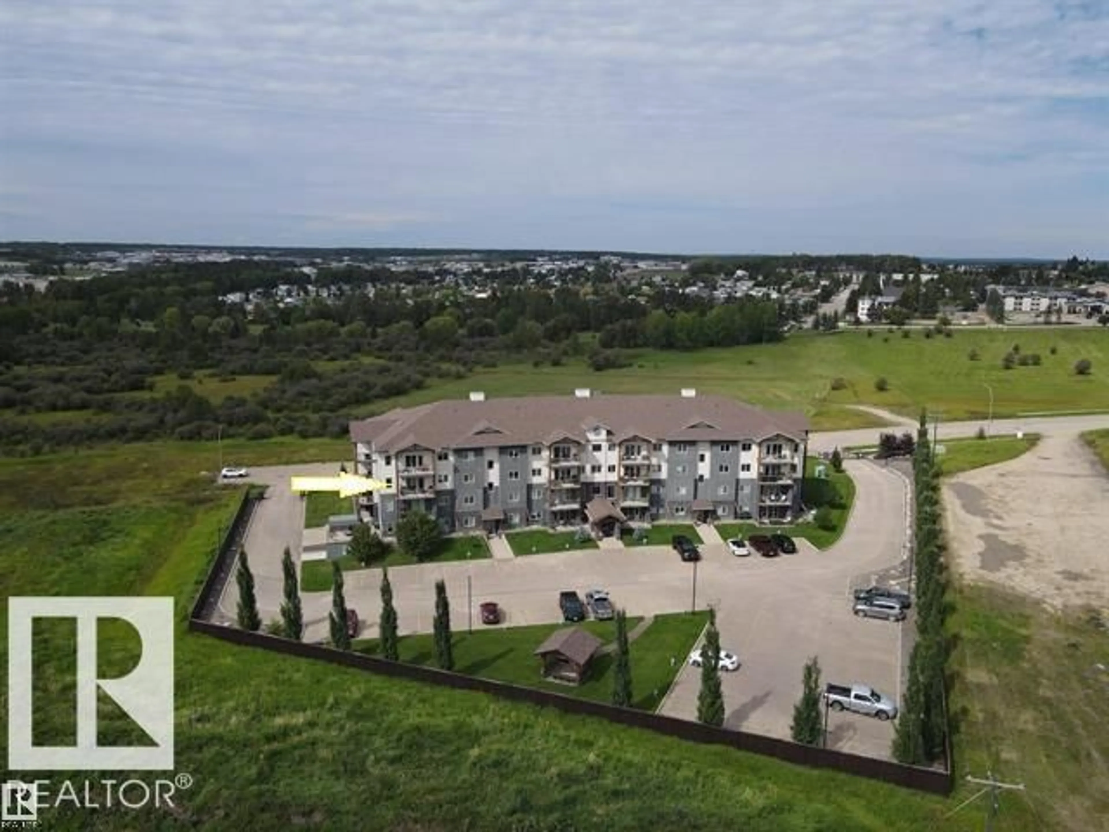 A pic from outside/outdoor area/front of a property/back of a property/a pic from drone, unknown for #302 - 5201 BROUGHAM DR, Drayton Valley Alberta T7A0C8
