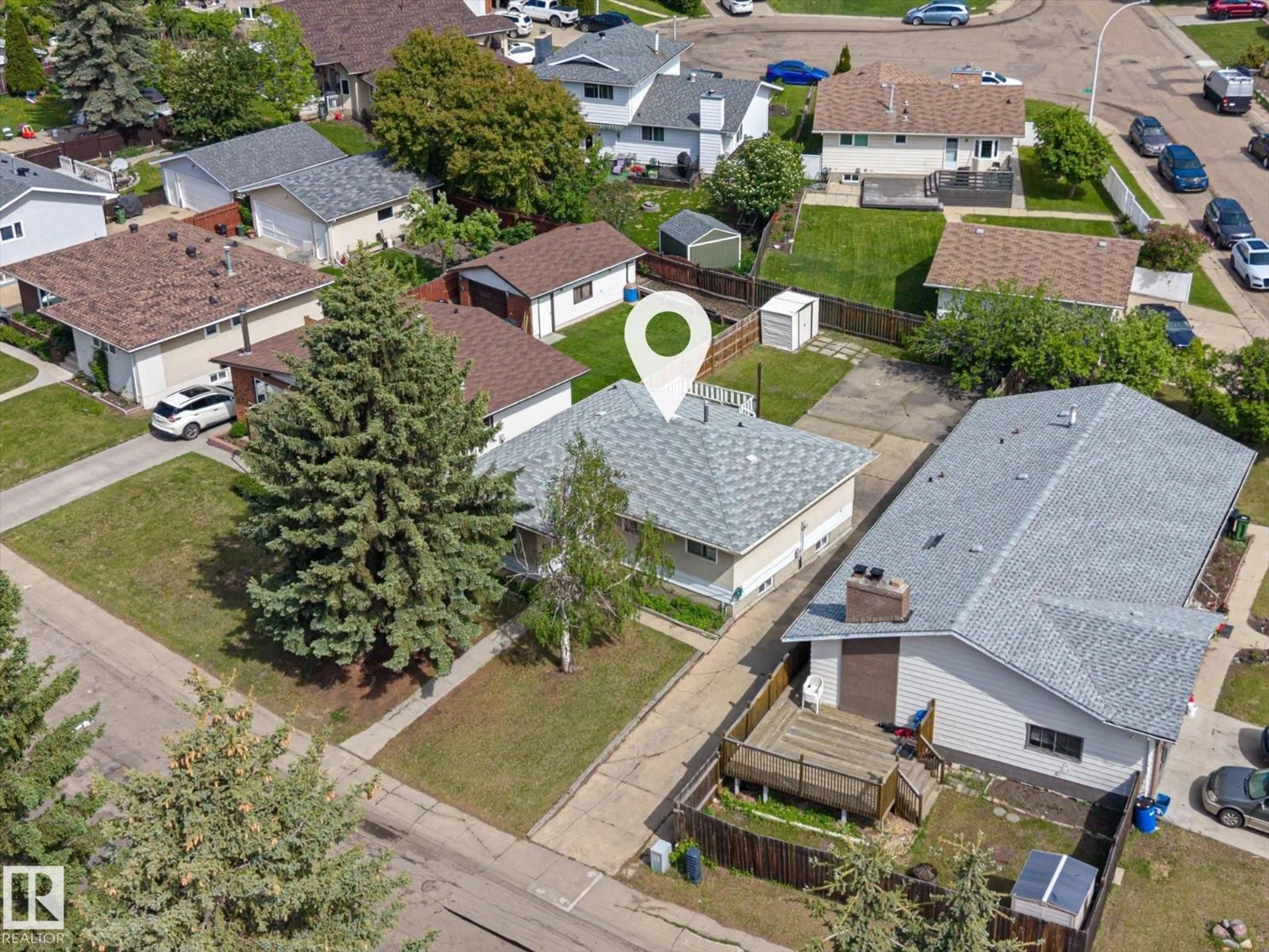 A pic from outside/outdoor area/front of a property/back of a property/a pic from drone, street for NW - 11408 165 AV, Edmonton Alberta T5X3W6