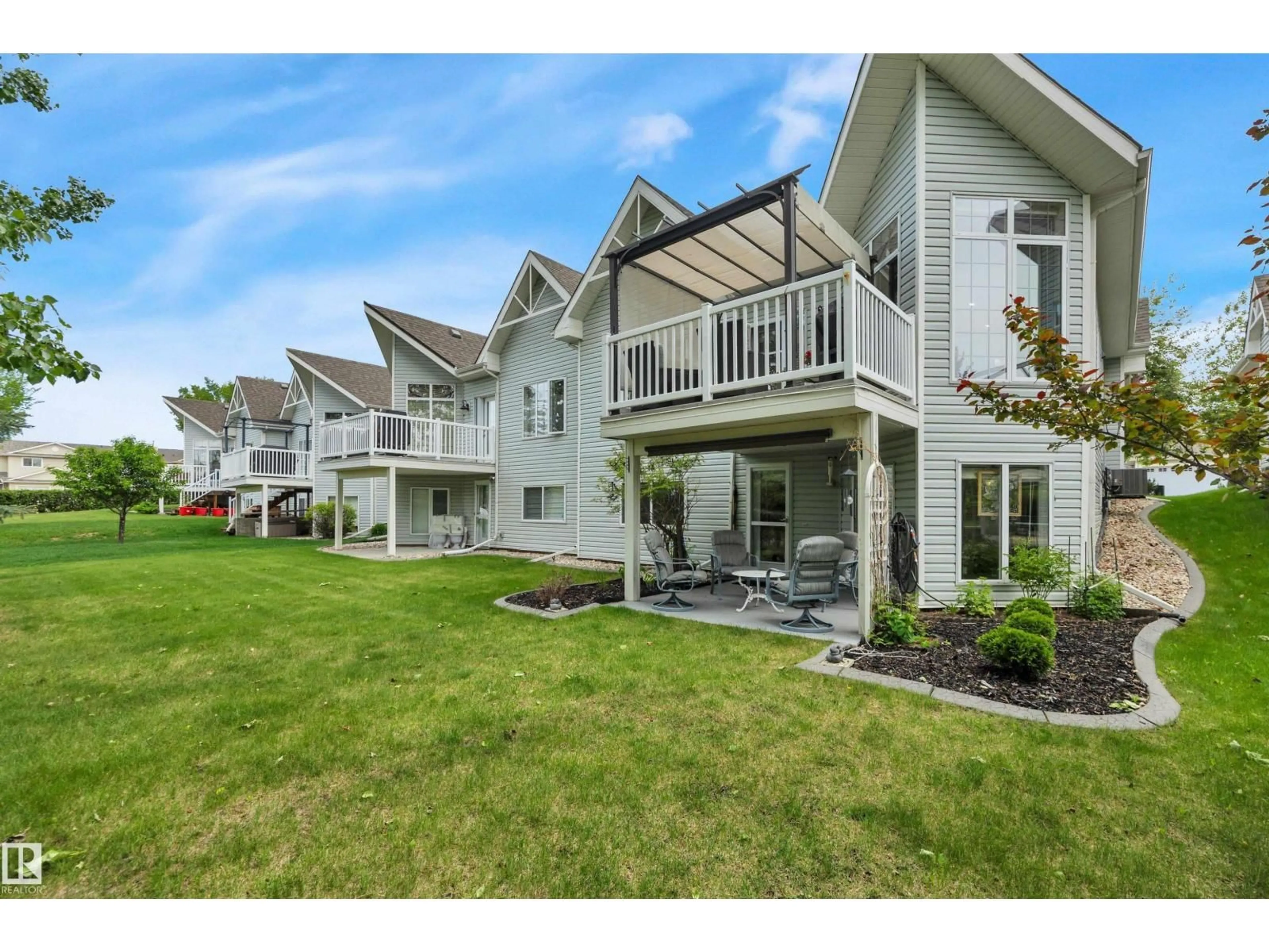 Patio, water/lake/river/ocean view for 27 BRIARWOOD VG, Stony Plain Alberta T7Z2Y7