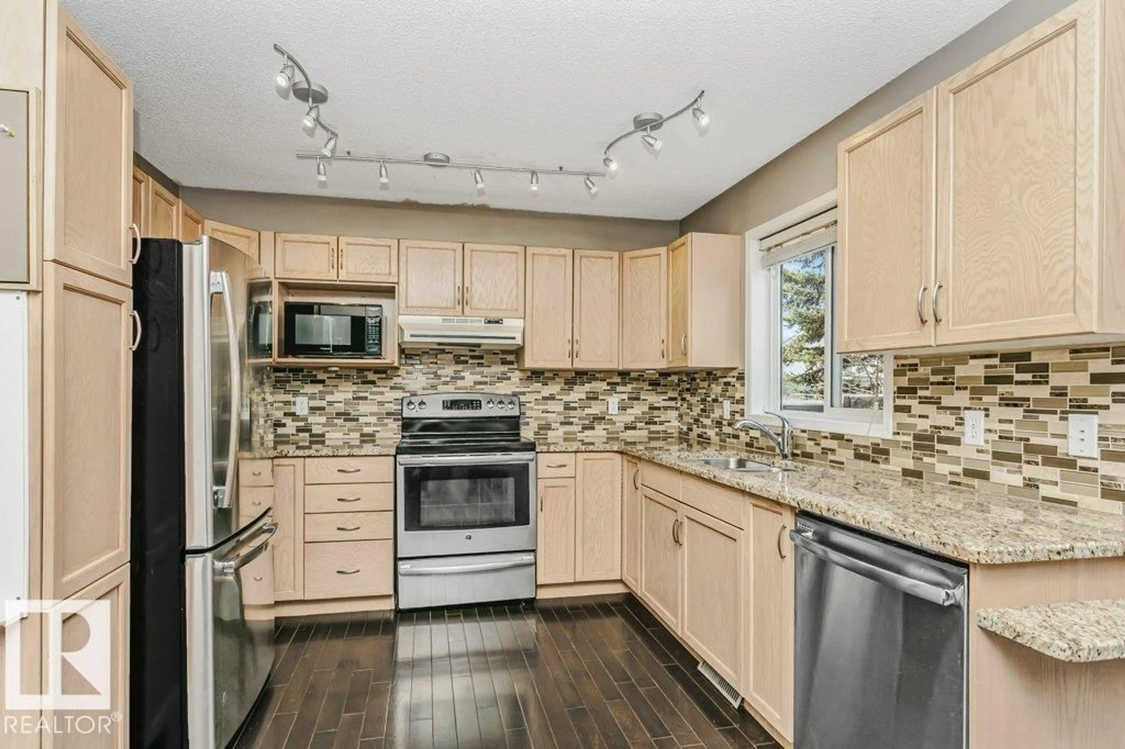 Open concept kitchen, ceramic/tile floor for 15827 133 ST NW, Edmonton Alberta T6V1E5