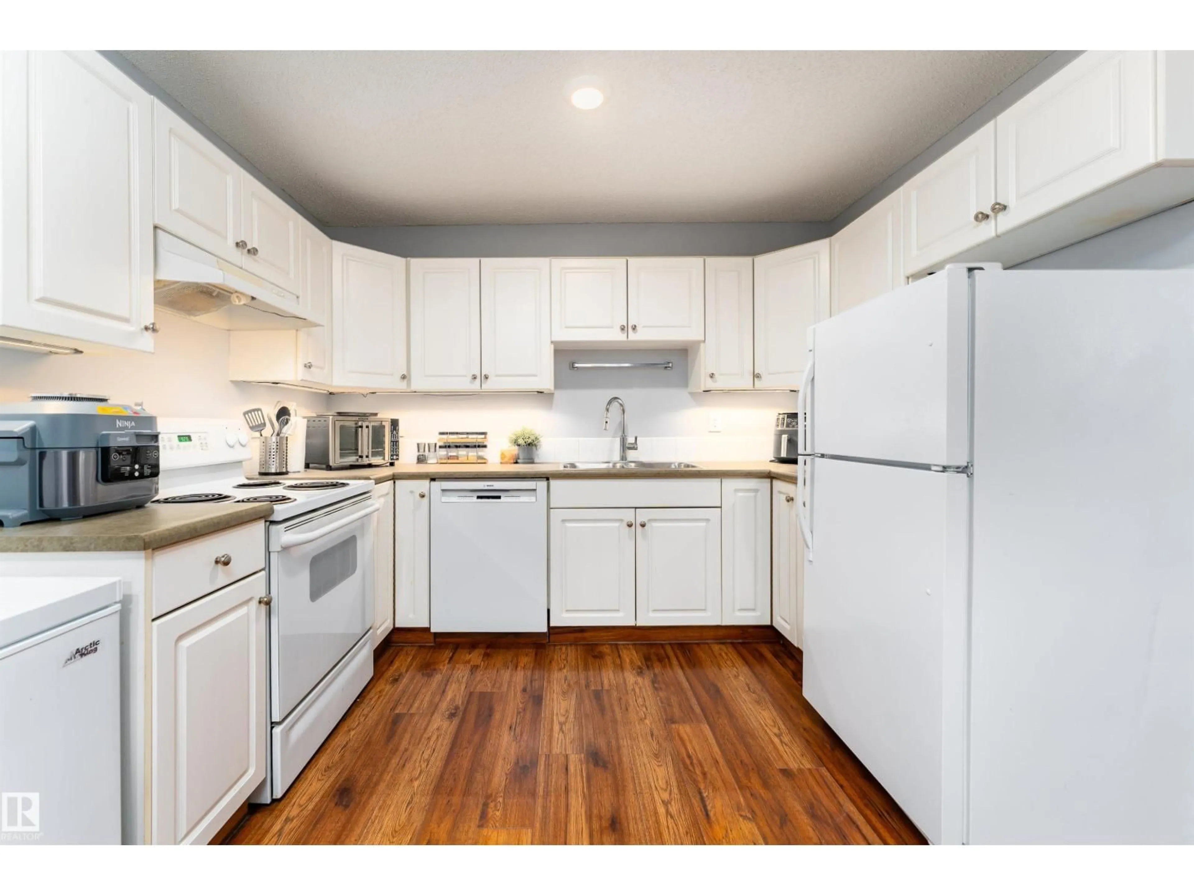 Standard kitchen, wood/laminate floor for #26 - 10208 113 ST, Edmonton Alberta T5G0W9