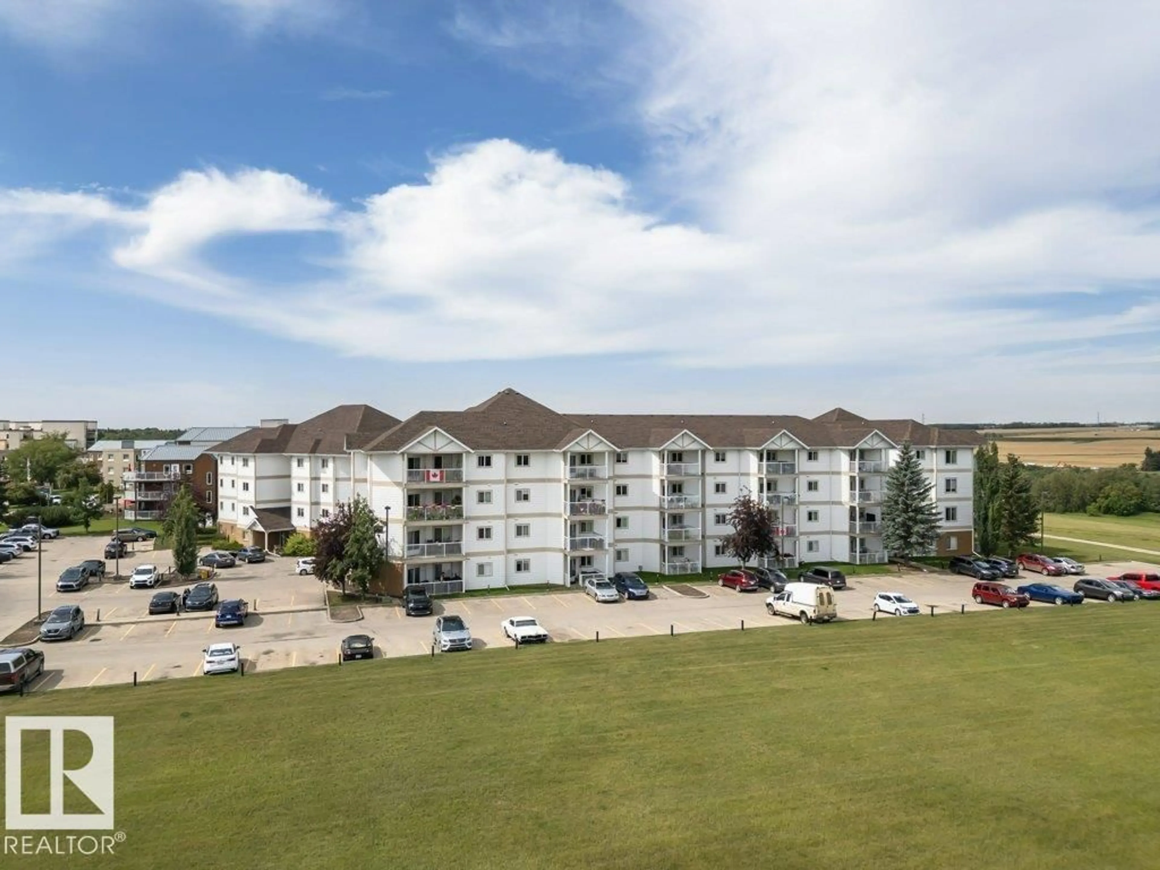 A pic from outside/outdoor area/front of a property/back of a property/a pic from drone, unknown for #205 - 9930 100 AV, Fort Saskatchewan Alberta T8L4L2