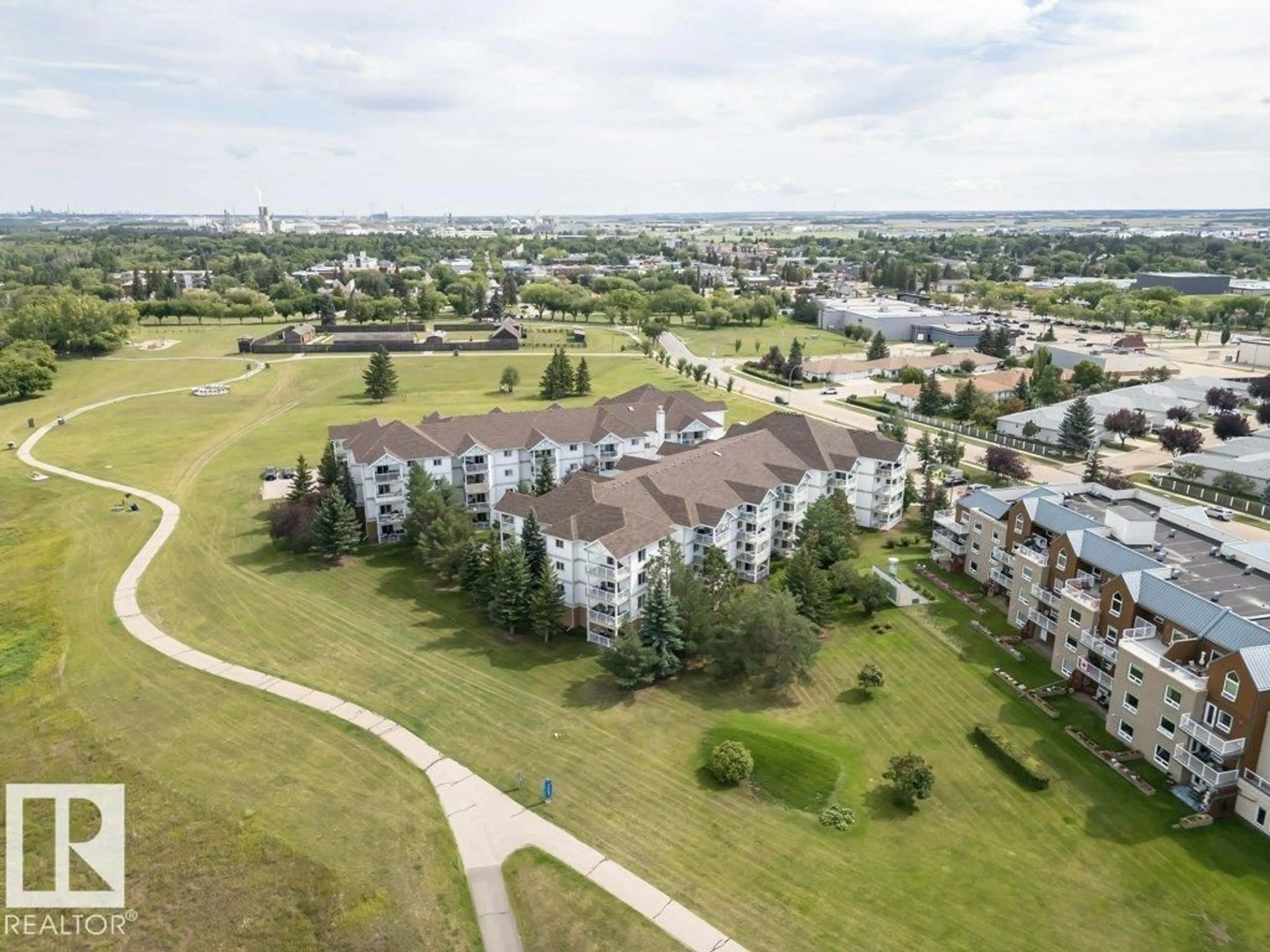 A pic from outside/outdoor area/front of a property/back of a property/a pic from drone, city buildings view from balcony for #205 - 9930 100 AV, Fort Saskatchewan Alberta T8L4L2