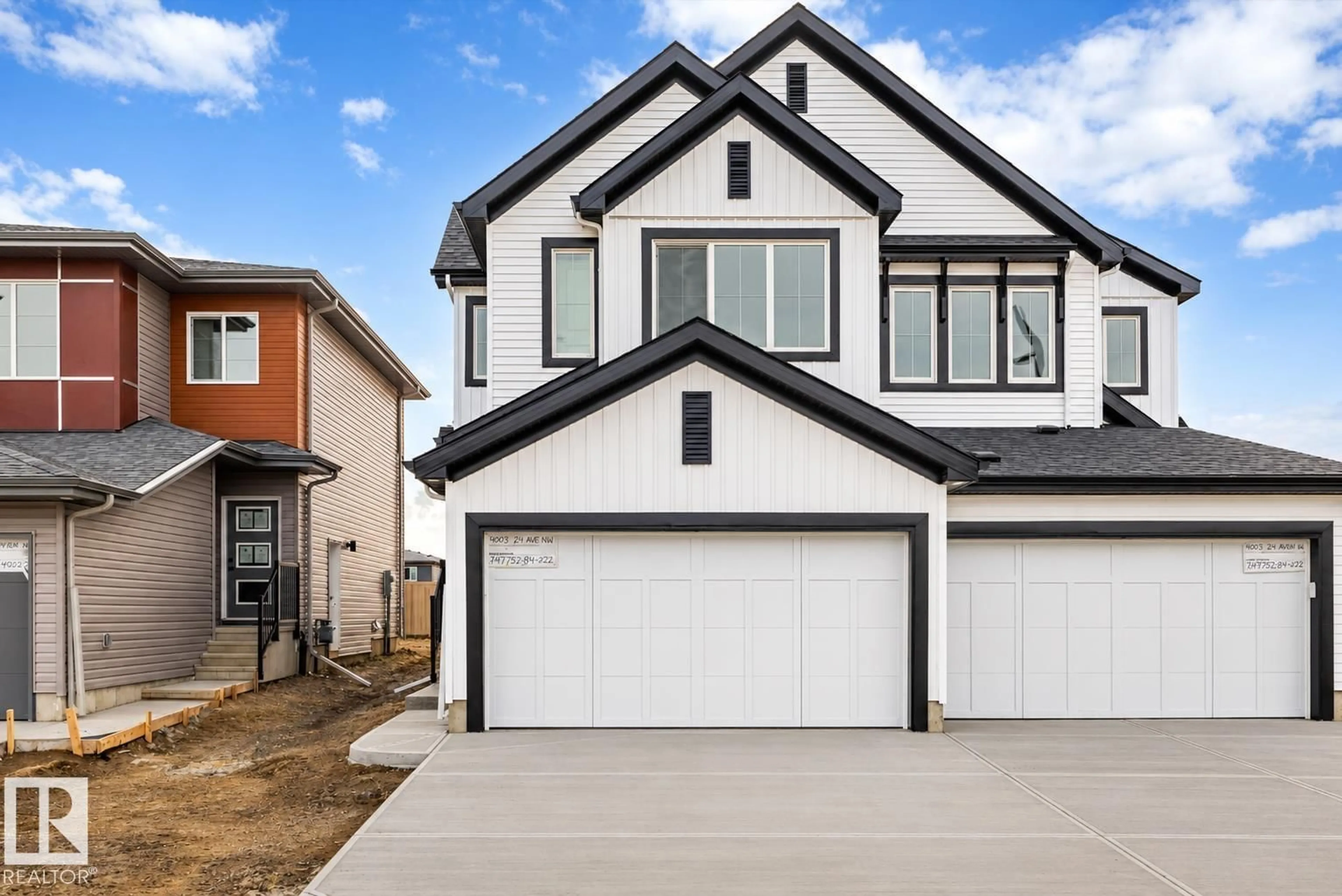 Home with vinyl exterior material, street for 19003 24 AV, Edmonton Alberta T6M3L3