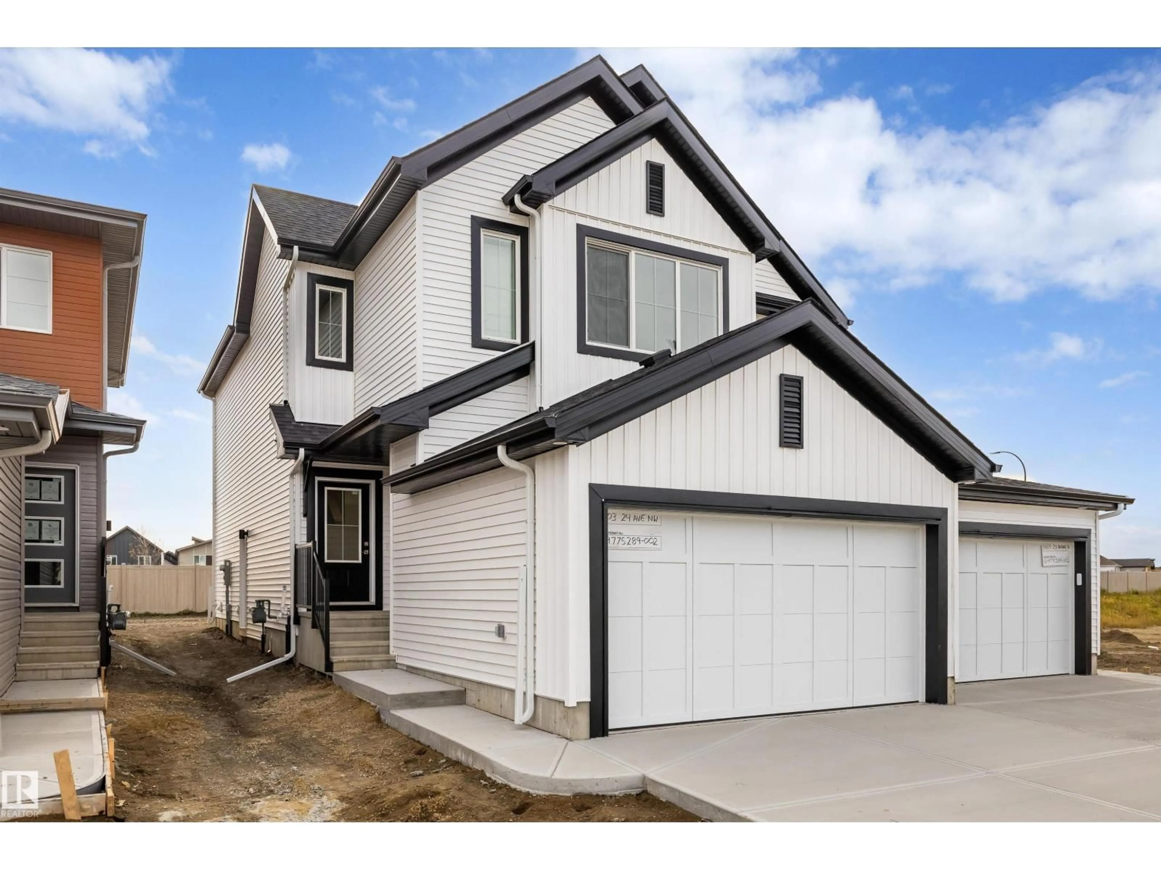 Home with vinyl exterior material, street for 19003 24 AV, Edmonton Alberta T6M3L3