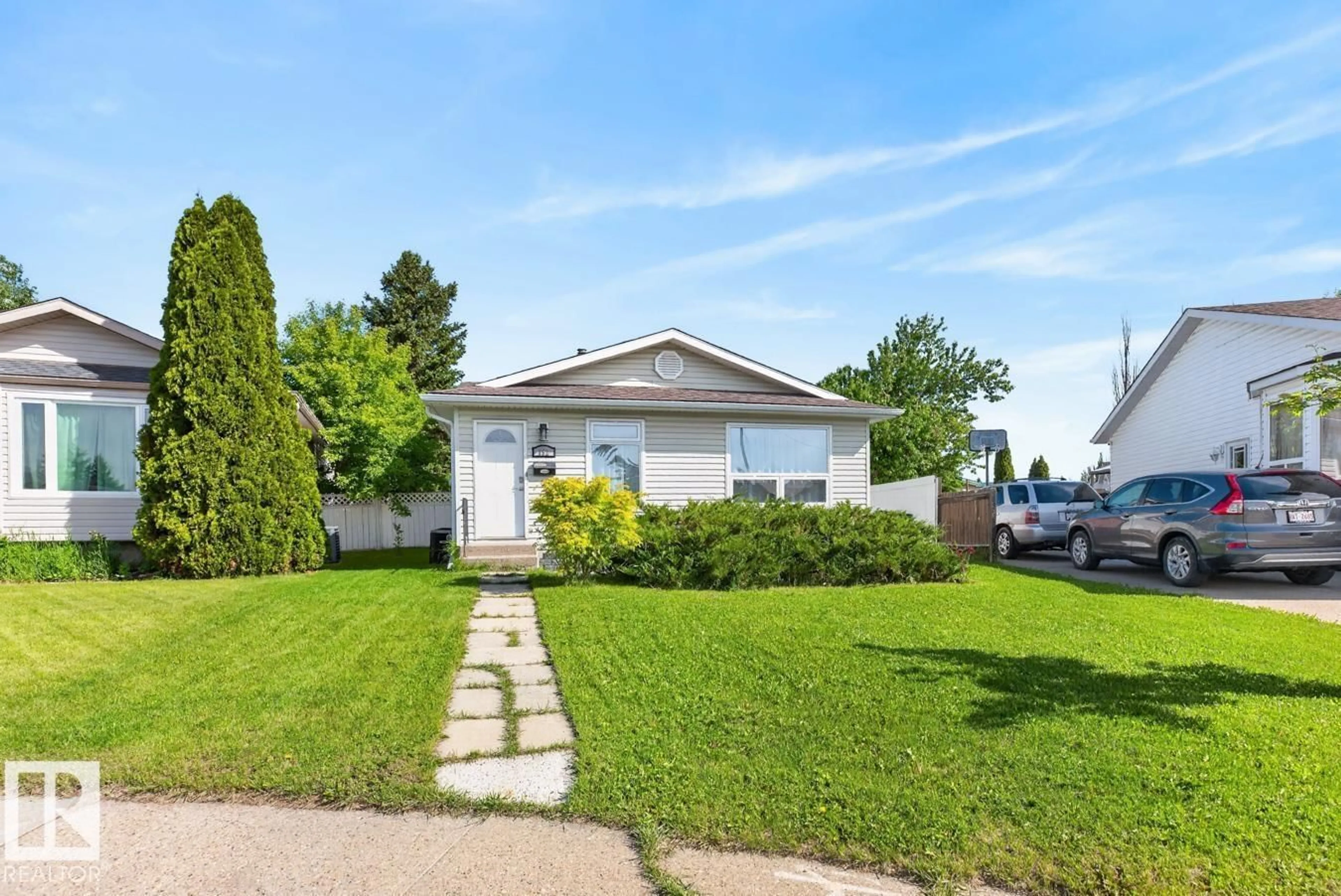 Home with vinyl exterior material, street for 152 WARWICK RD, Edmonton Alberta T5X4P8