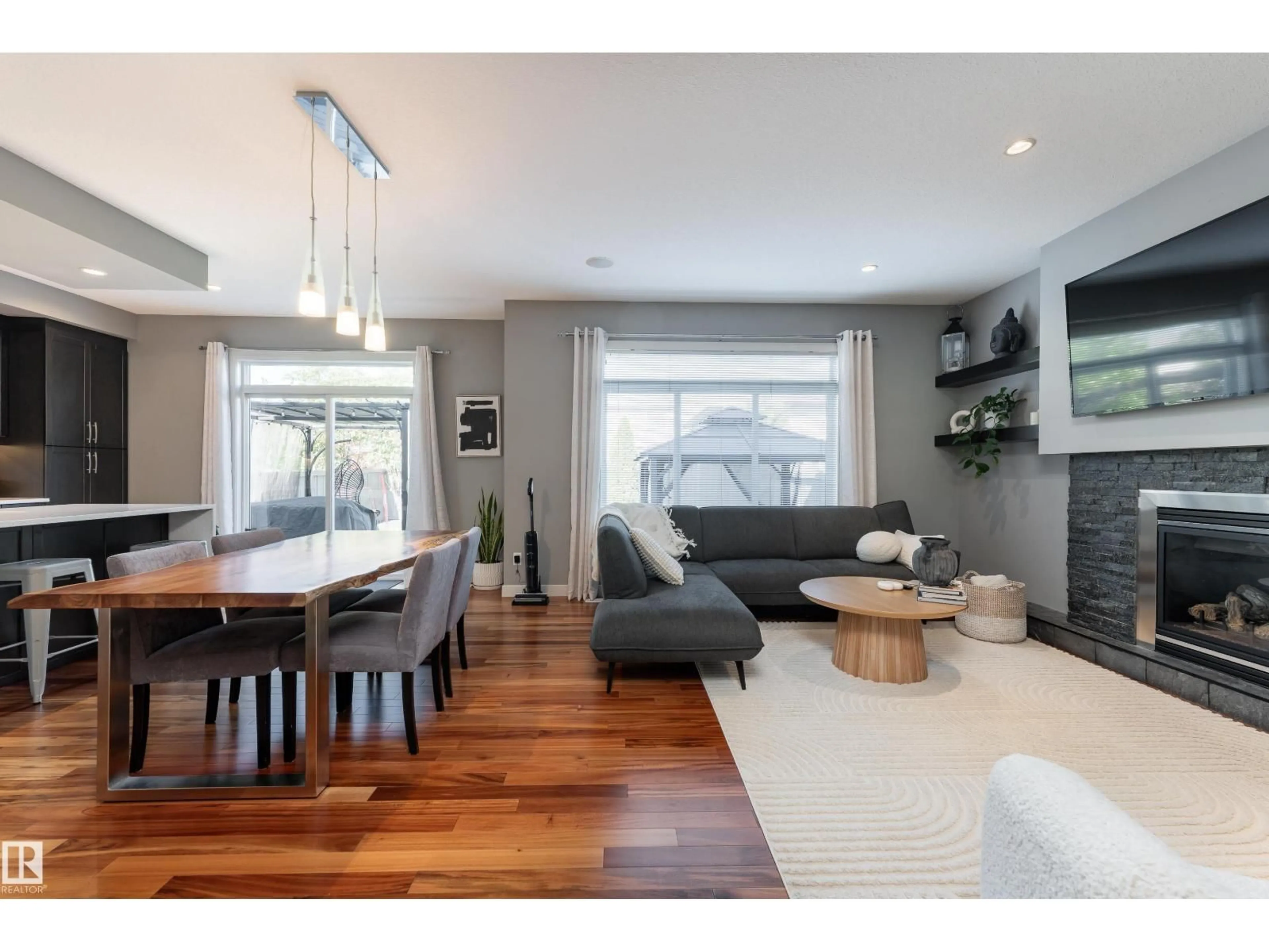 Living room with furniture, wood/laminate floor for 12932 201 ST, Edmonton Alberta T5S0E4
