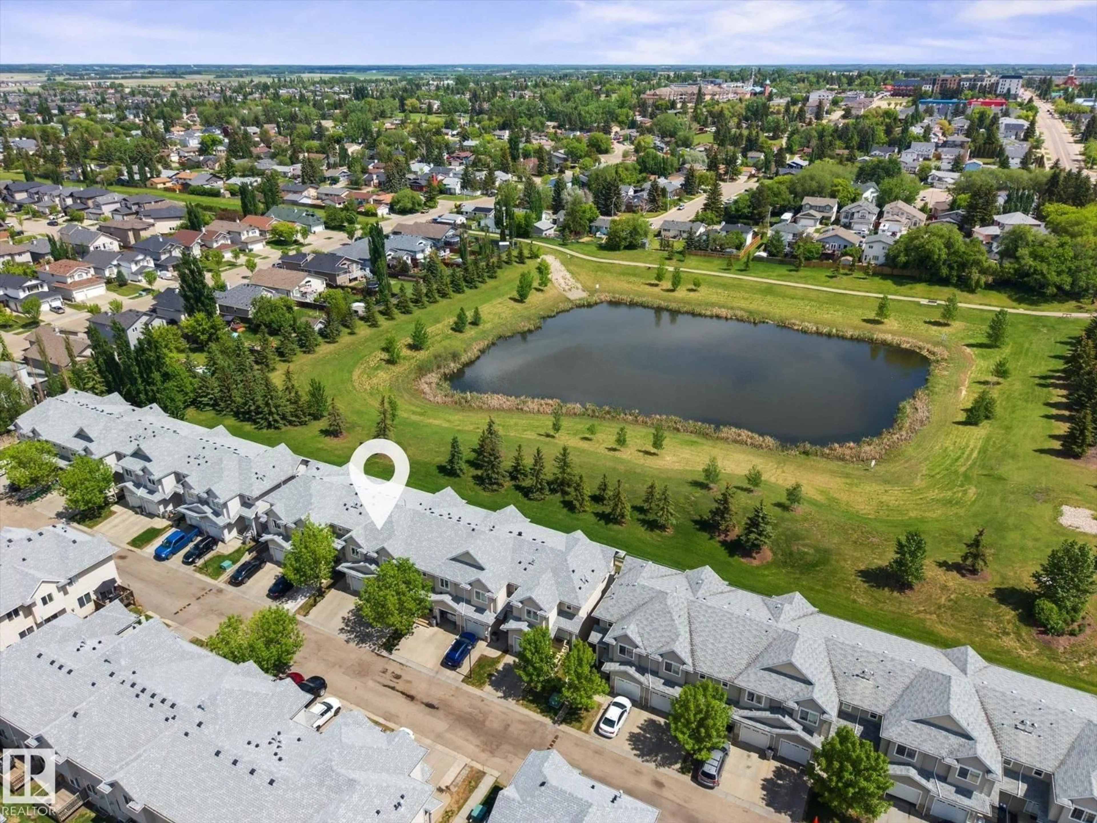 A pic from outside/outdoor area/front of a property/back of a property/a pic from drone, water/lake/river/ocean view for 88 5001 62 ST, Beaumont Alberta T4X0C7