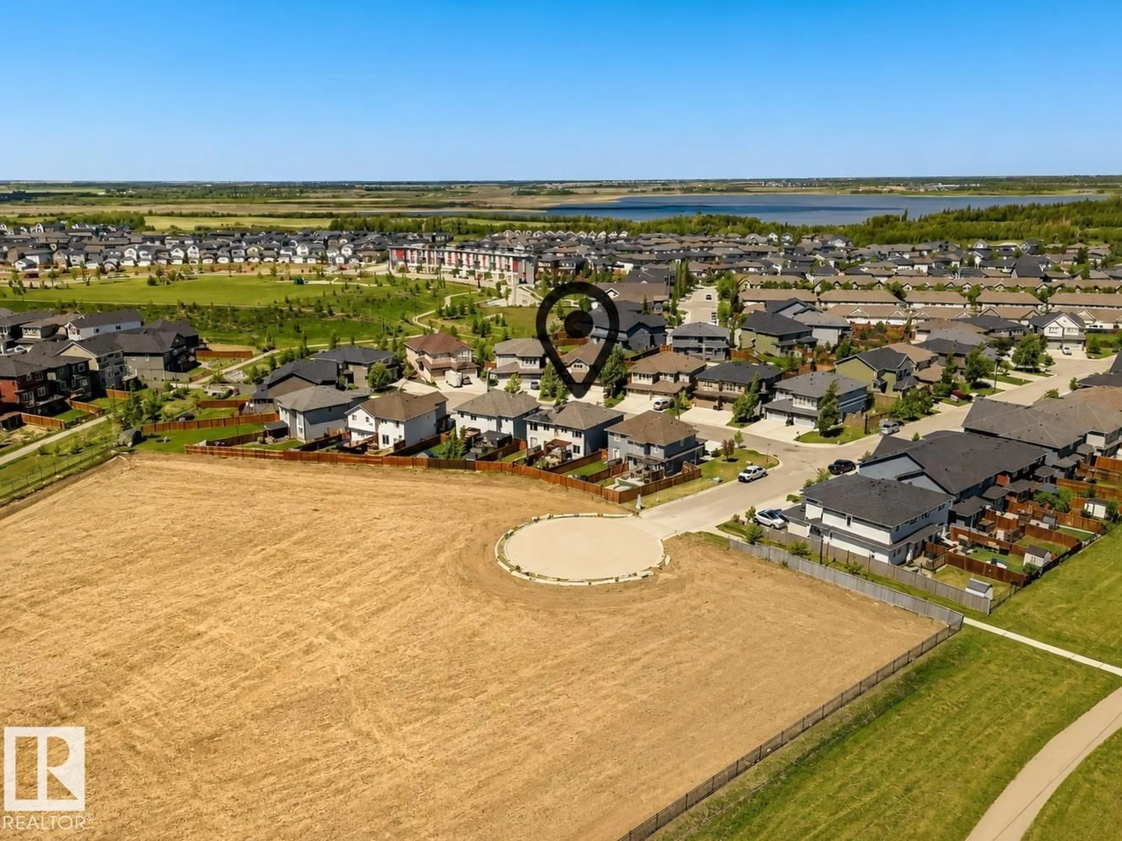 A pic from outside/outdoor area/front of a property/back of a property/a pic from drone, water/lake/river/ocean view for NW - 20507 128 AV, Edmonton Alberta T5S0L8