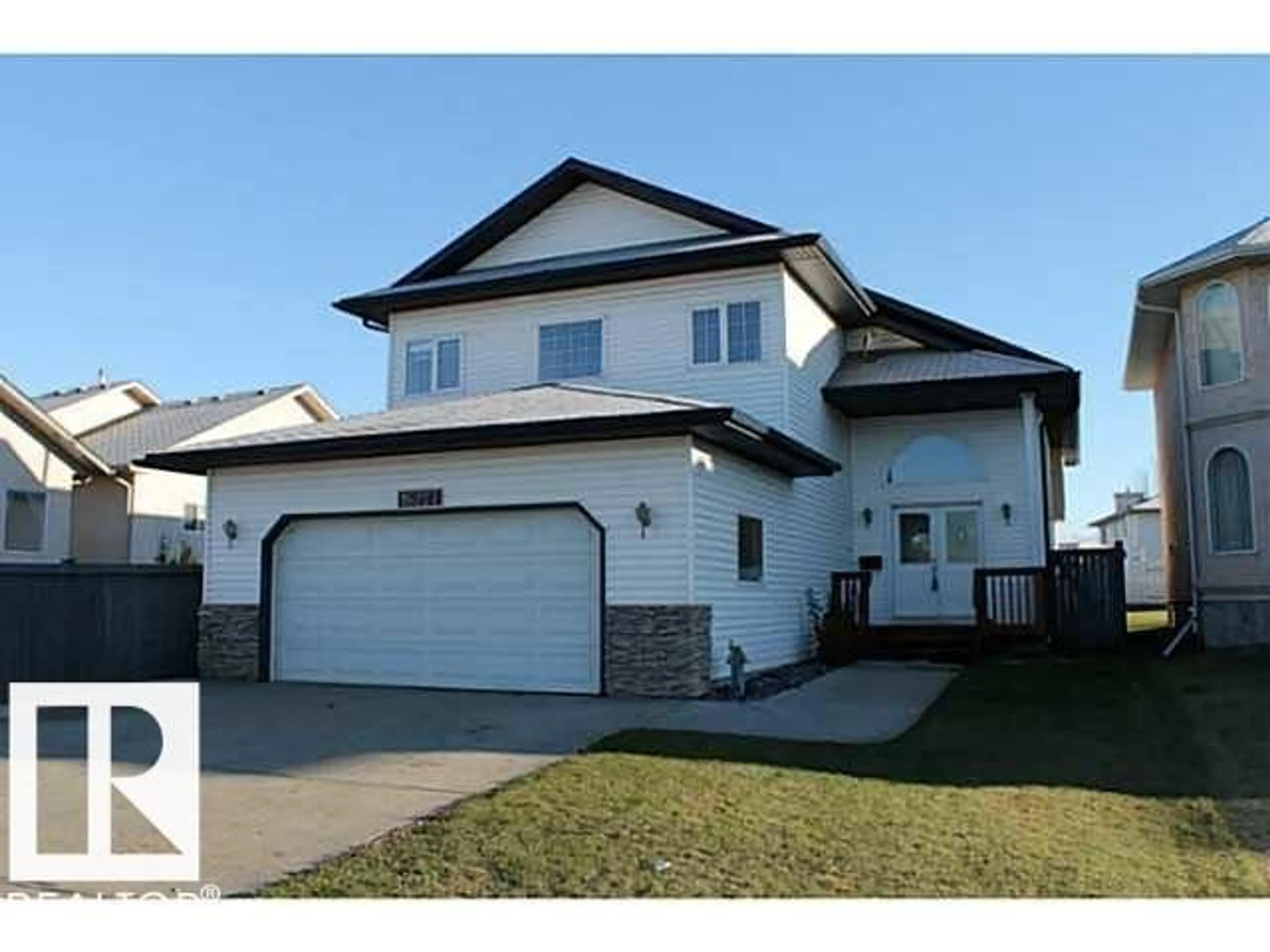 Home with vinyl exterior material, street for NW - 16227 64 ST, Edmonton Alberta T5Y3T2