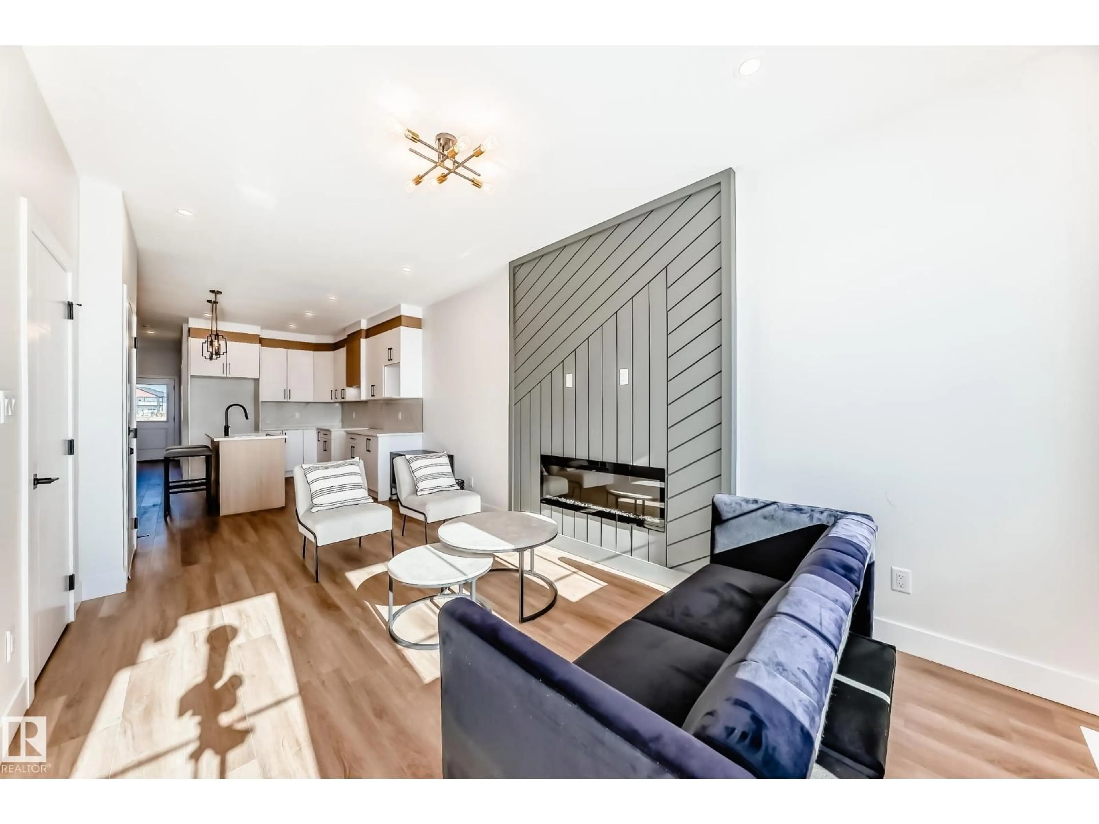 Living room with furniture, wood/laminate floor for 100 ELLIOTT WD, Fort Saskatchewan Alberta T8L1R8