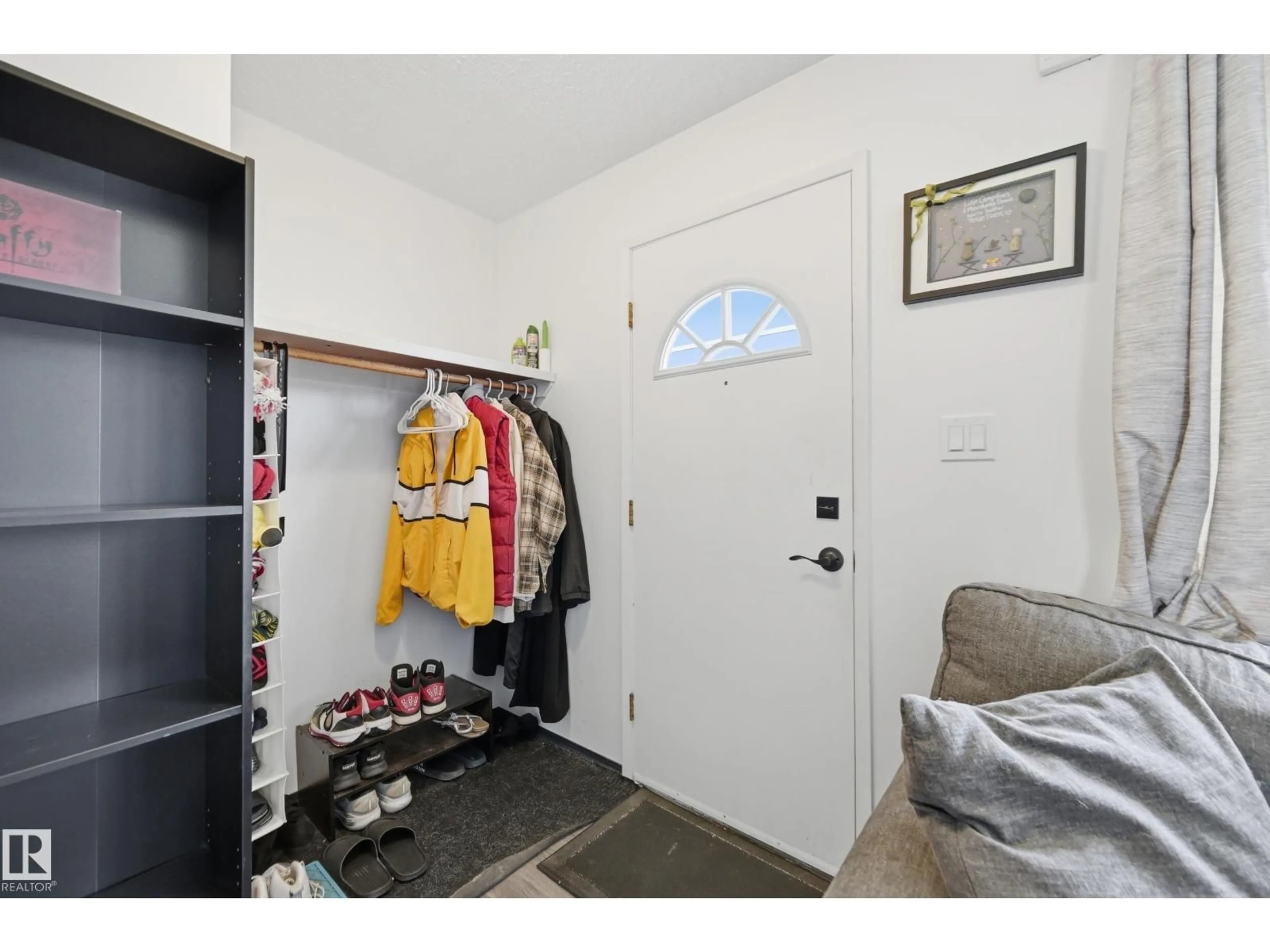 Indoor entryway for 5515 143 AV, Edmonton Alberta T5A1J9