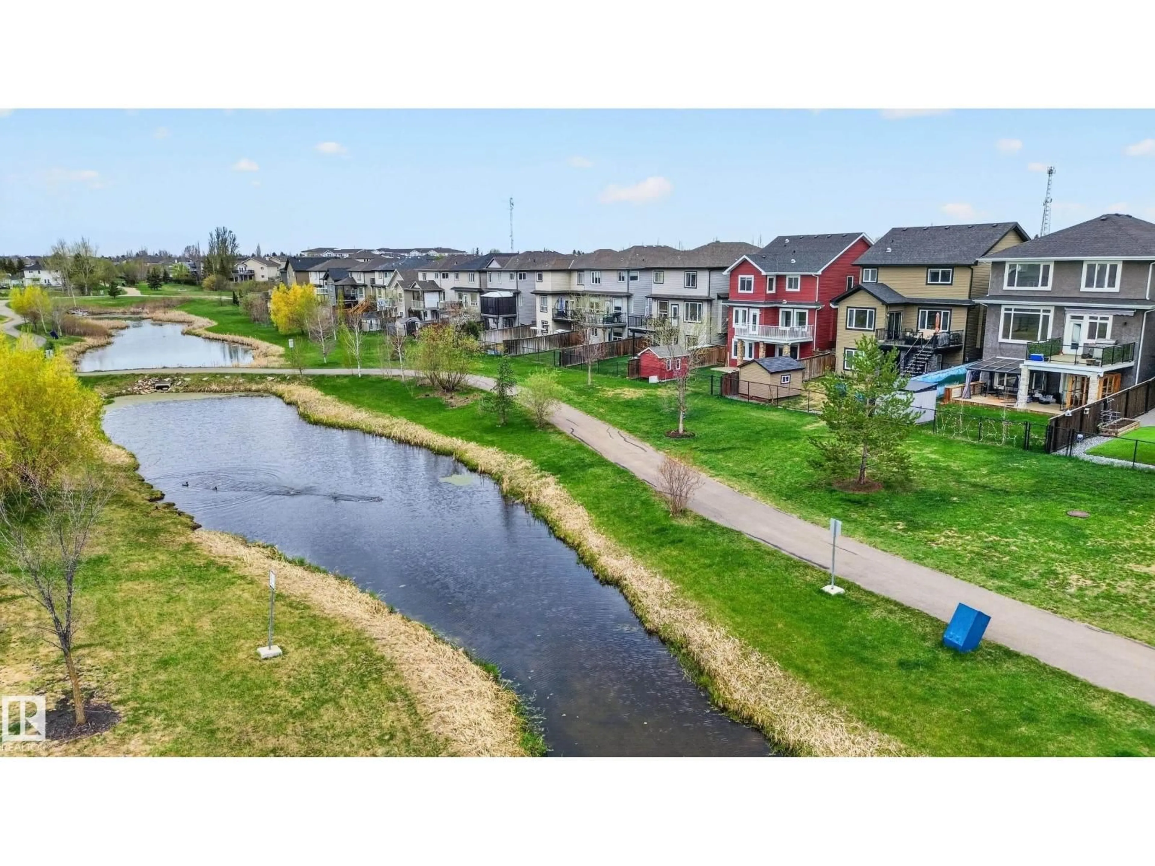 A pic from outside/outdoor area/front of a property/back of a property/a pic from drone, water/lake/river/ocean view for 37 CRANSTON PL, Fort Saskatchewan Alberta T8L0K7