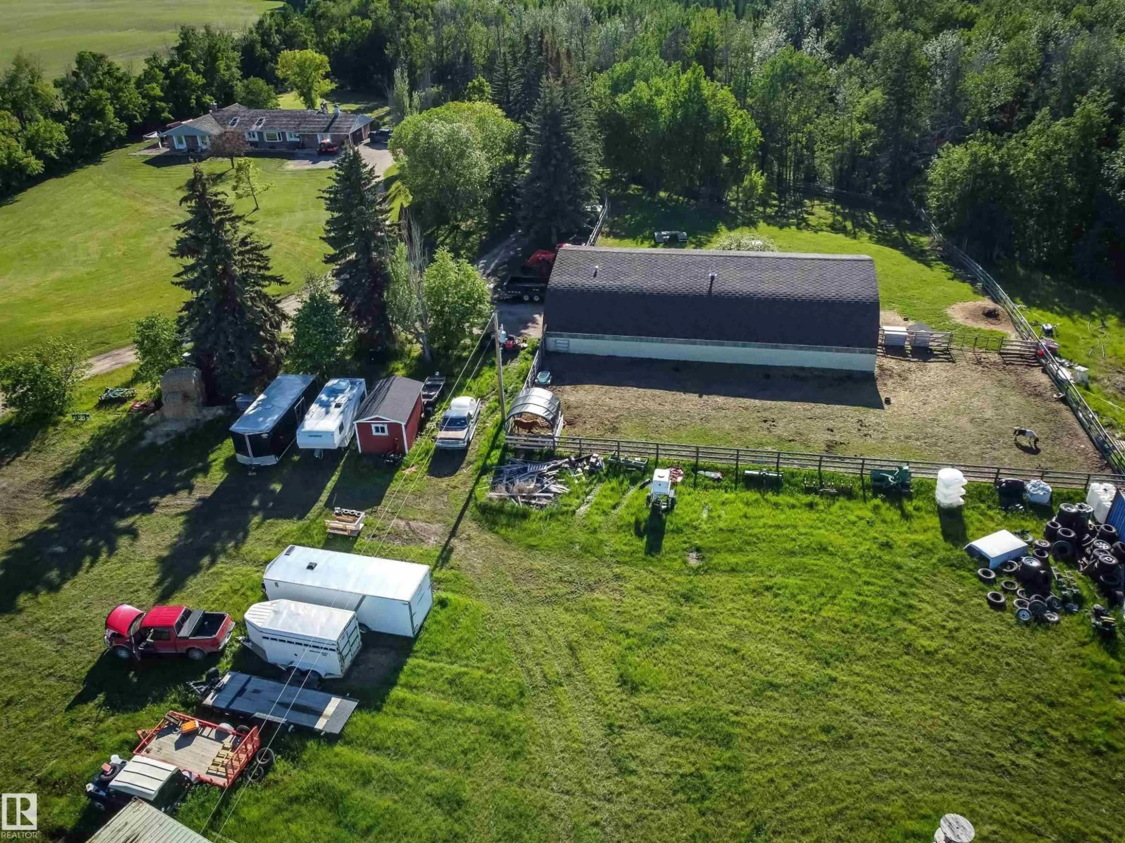 A pic from outside/outdoor area/front of a property/back of a property/a pic from drone, unknown for 52102 RGE ROAD 280, Rural Parkland County Alberta T7Z1Y3