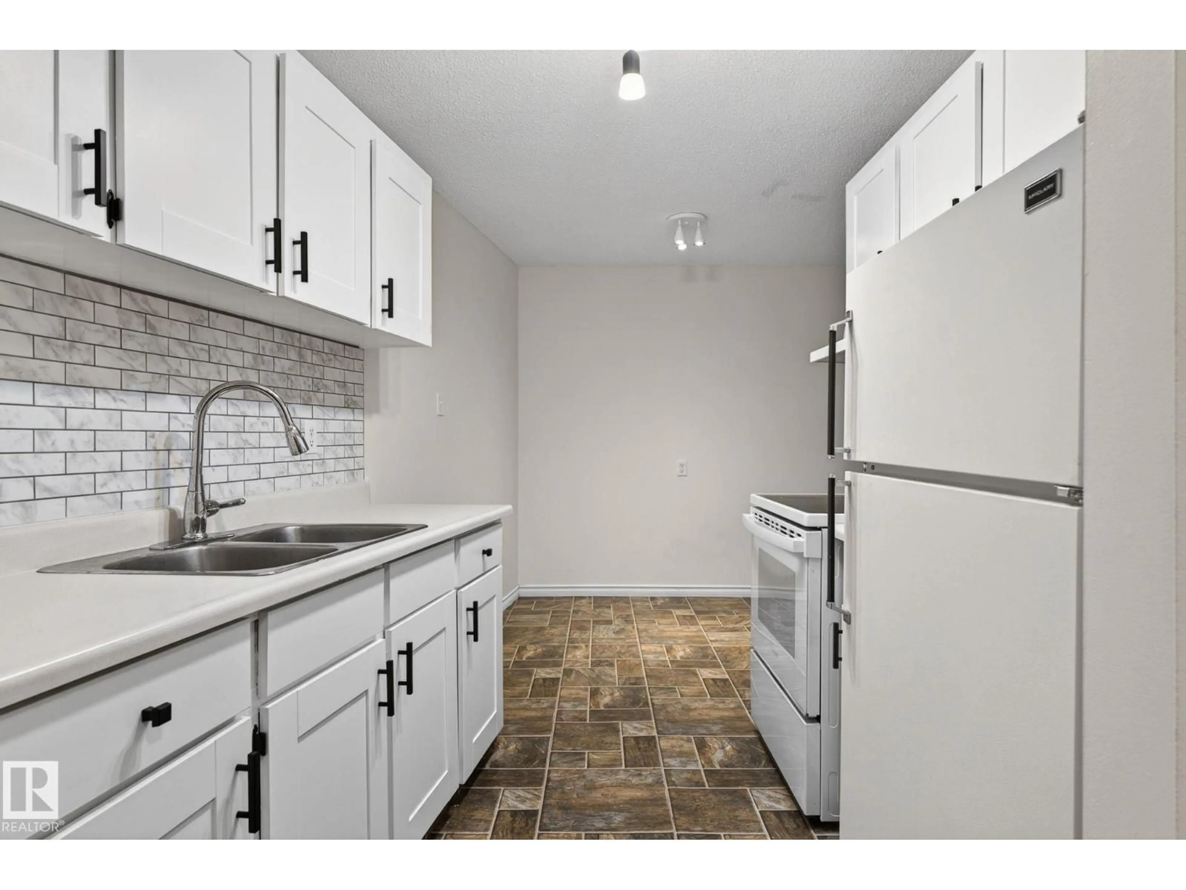 Standard kitchen, ceramic/tile floor for #305 - 10335 117 ST, Edmonton Alberta T5X1X9