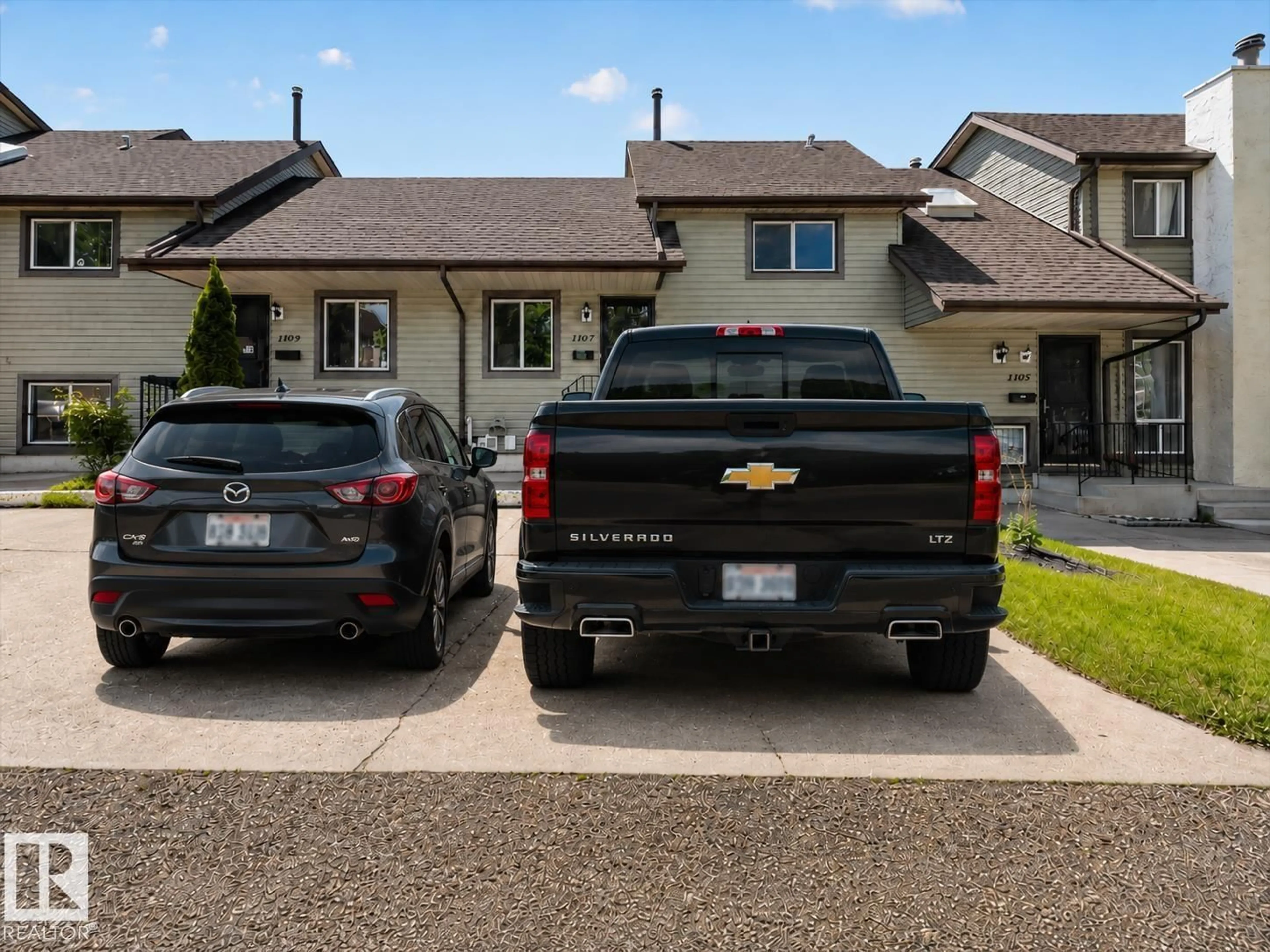 Home with vinyl exterior material, street for 1107 62 ST, Edmonton Alberta T6L2H7
